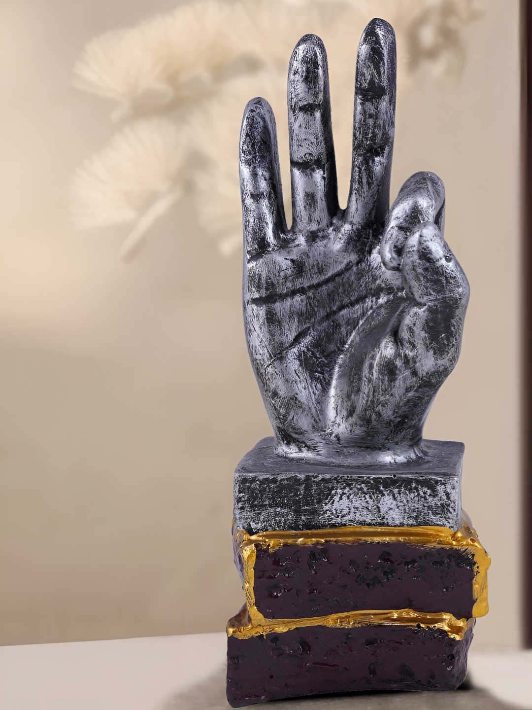 

Zart Silver-Toned Idol Showpiece