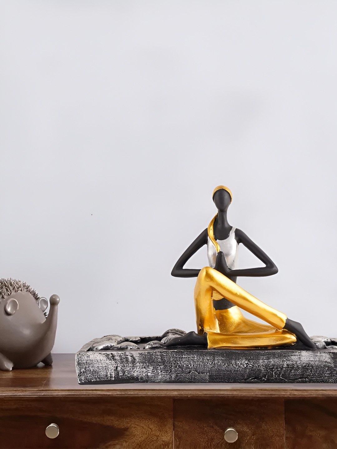 

Zart Black & Gold-Toned Other Figurine Showpiece
