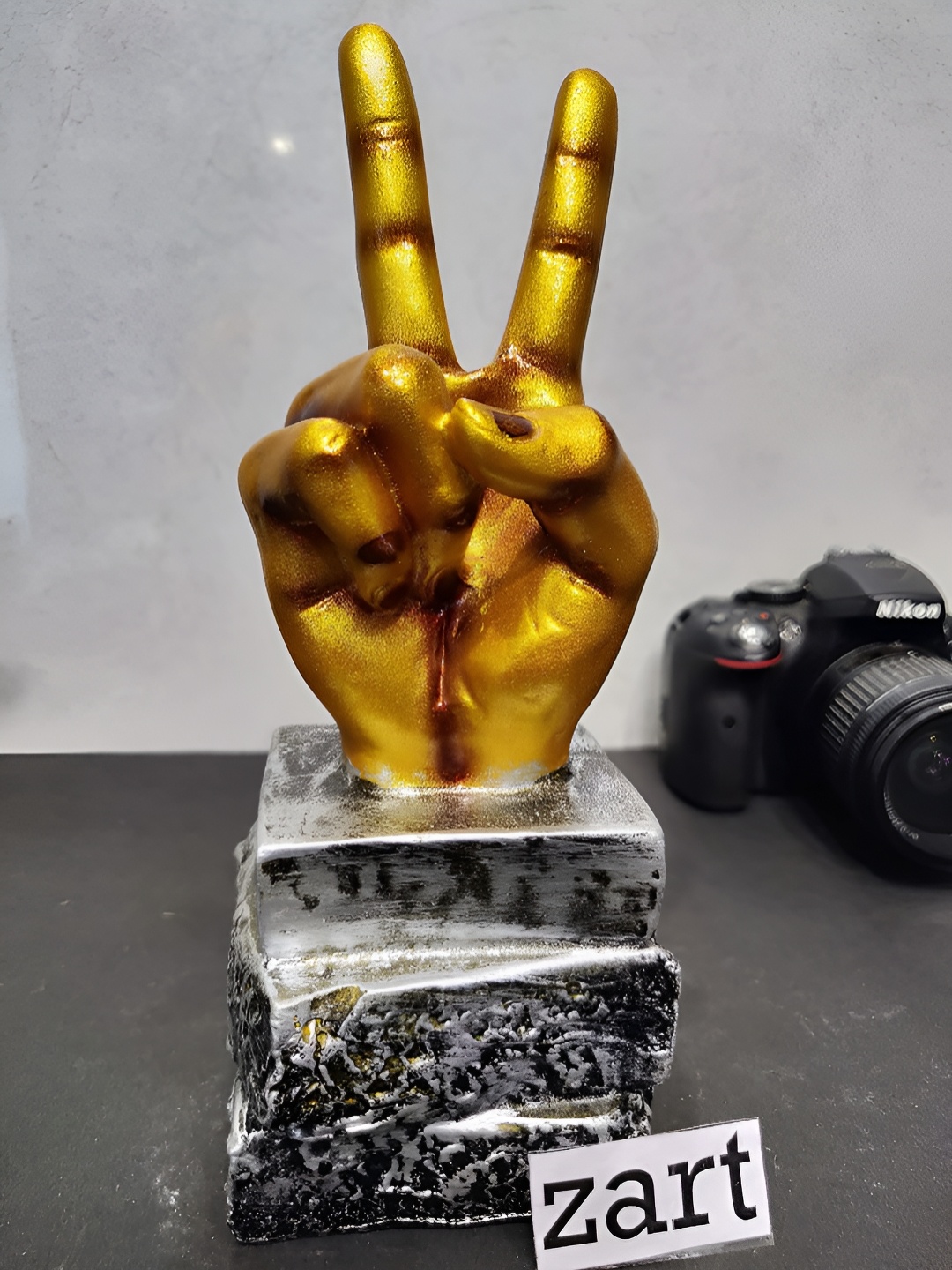 

Zart Gold-Toned Hand Gesture Curio Showpiece