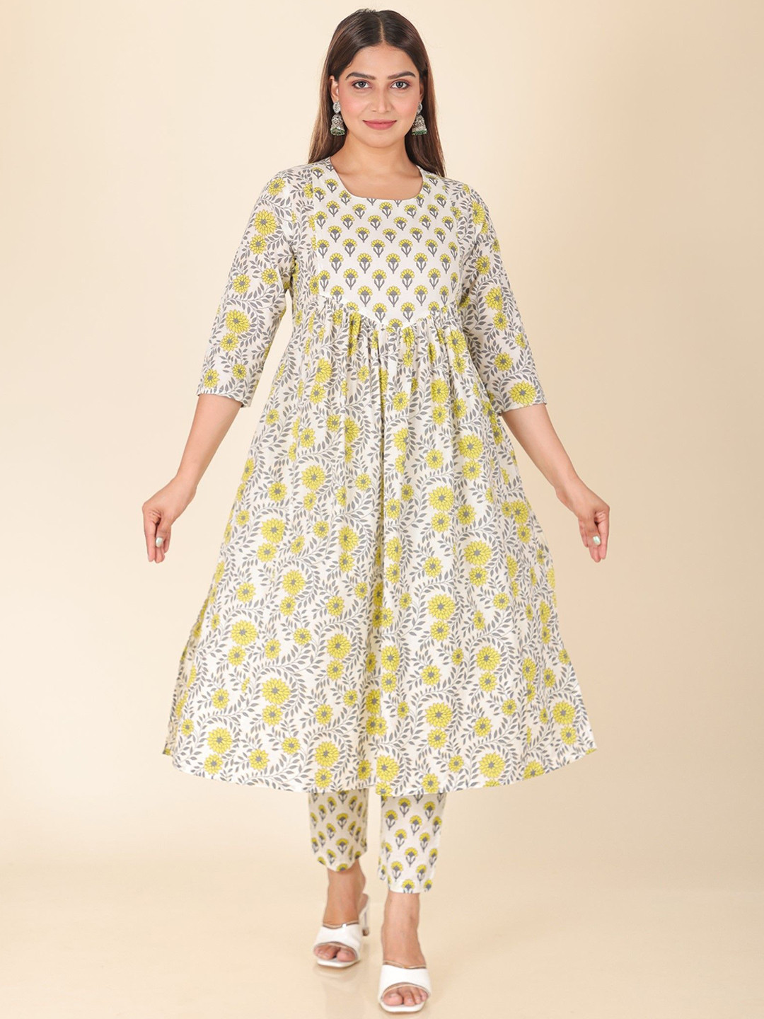 

Aramya Floral Printed Round Neck Three-Quarter Sleeves Regular Pure Cotton Kurta & Trouser, Yellow