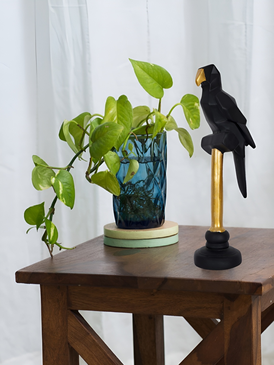 

Zart Black & Gold-Toned Parrot Sitting On Branch Showpiece