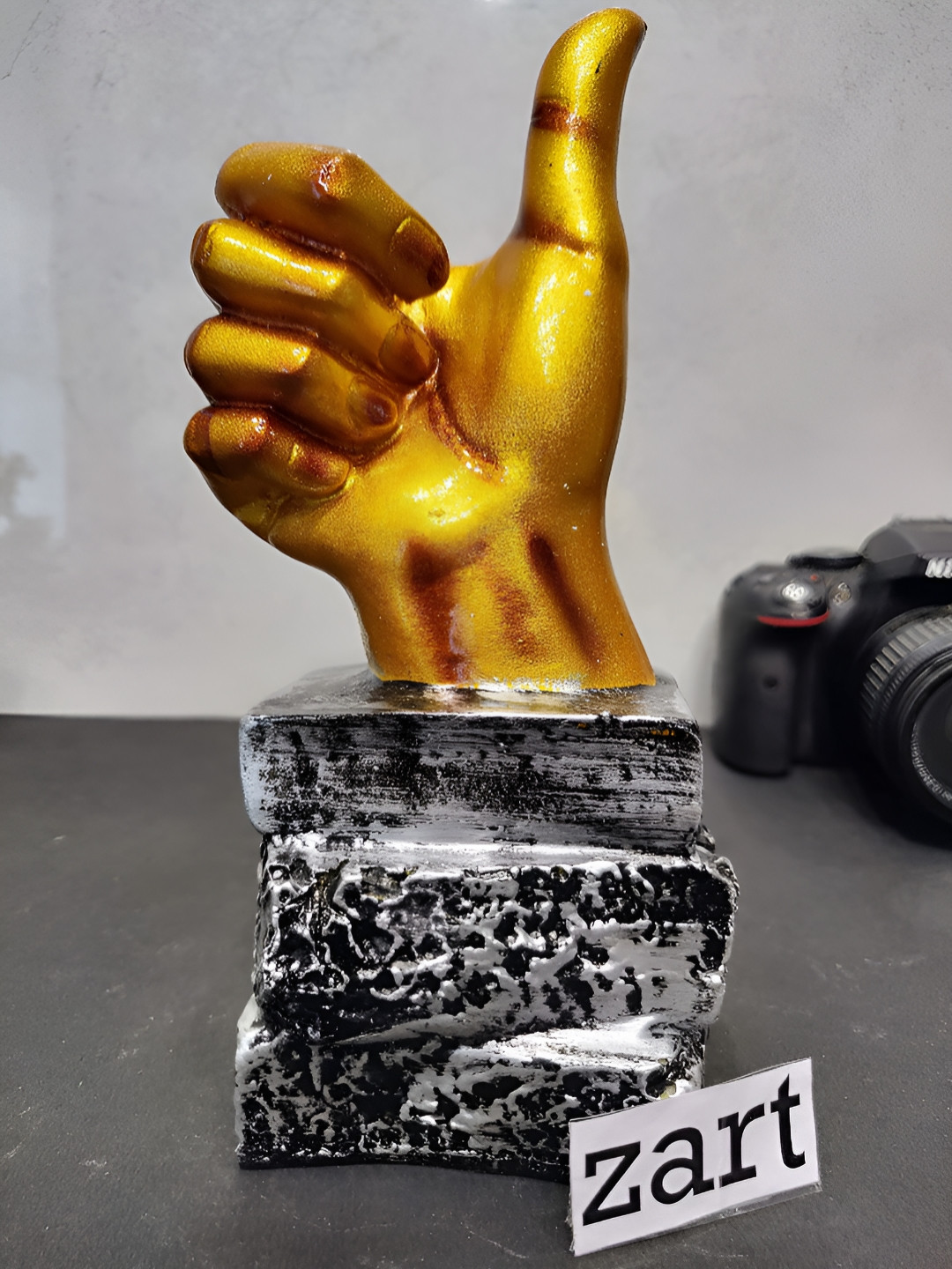 

Zart Gold-Toned Idol Showpiece