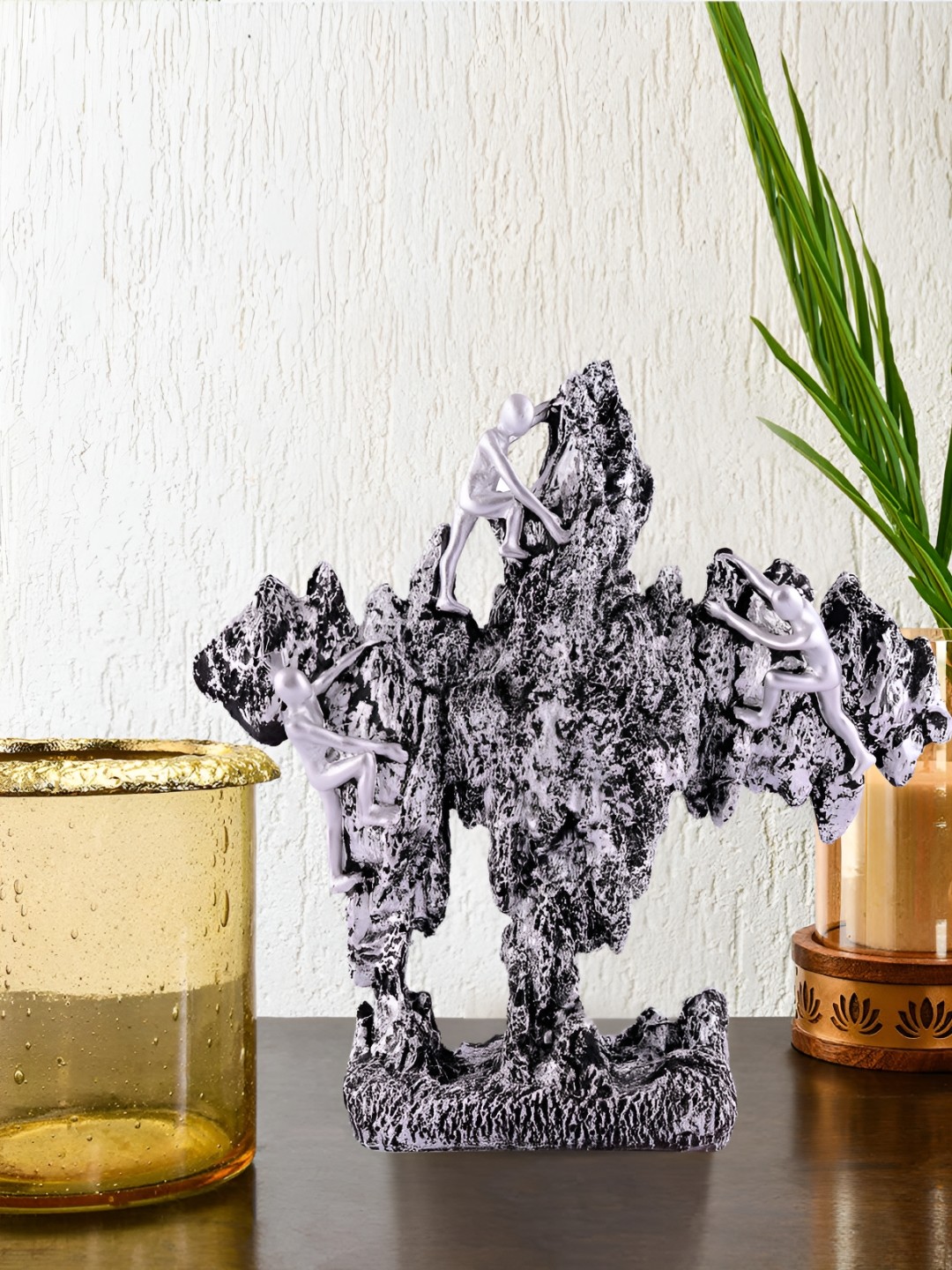 

Zart Silver-Toned Idol Showpiece