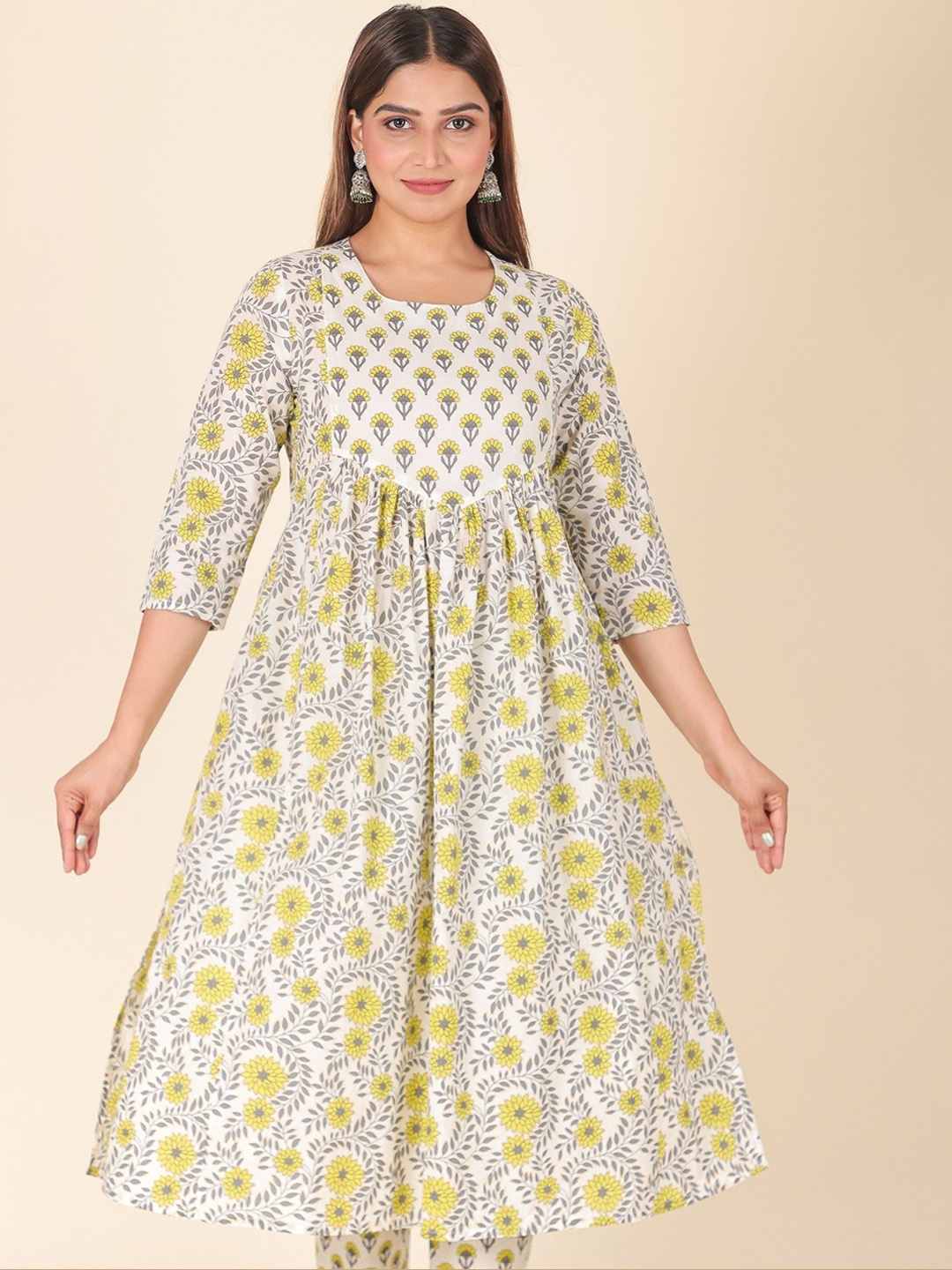 

Aramya Floral Printed Round Neck Three-Quarter Sleeves Regular Pure Cotton A-Line Kurta, Yellow