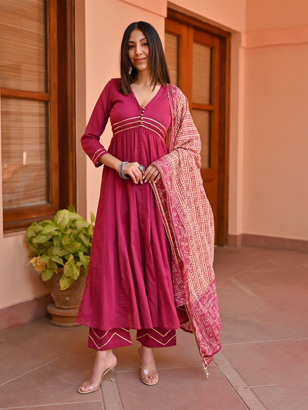 

Bunaai V Neck Anarkali Gotta Patti Kurta with Trousers & Dupatta, Magenta