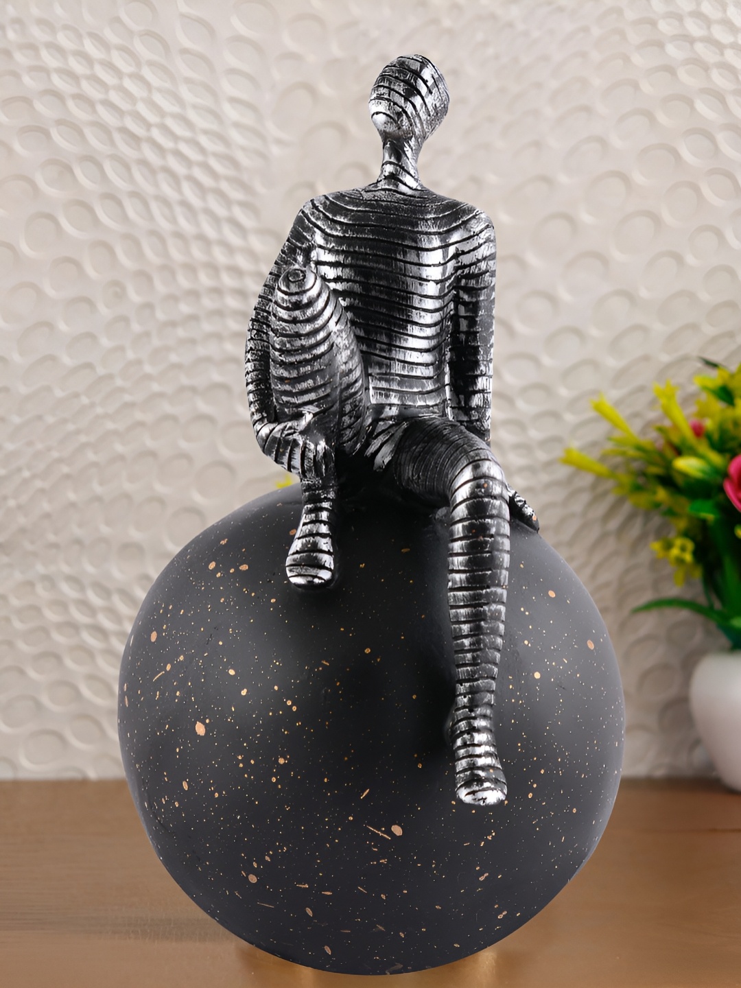 

Zart White Atlas Men Sitting on Ball Showpiece