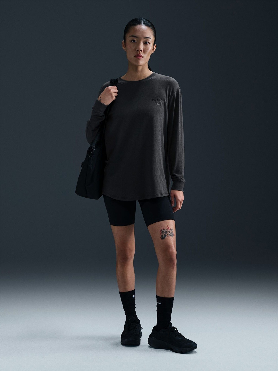 

Nike One Relaxed Women Cotton Dri-FIT Long-Sleeve Tops, Grey