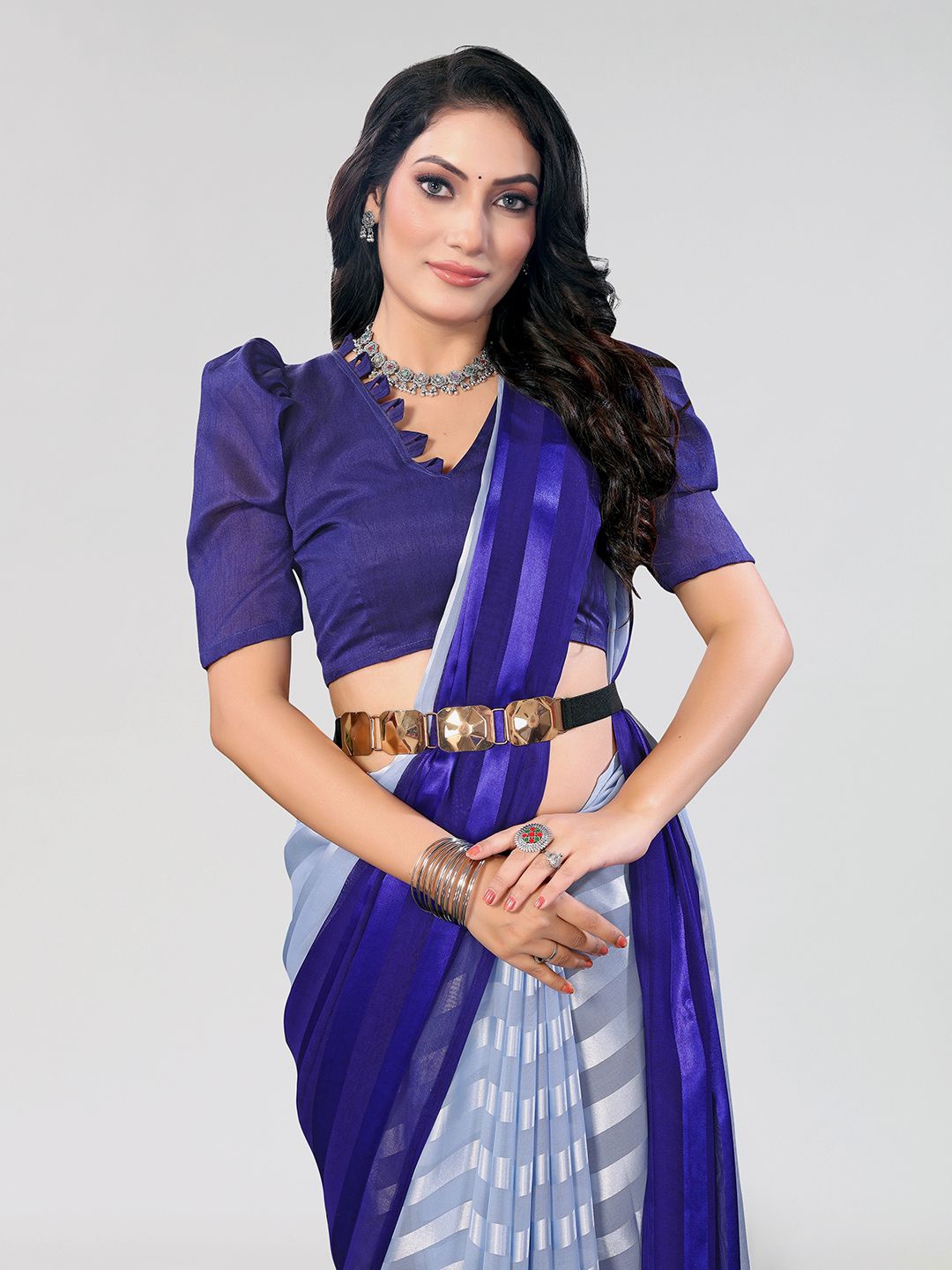 

Moda Rapido Women Striped Satin Saree, Blue