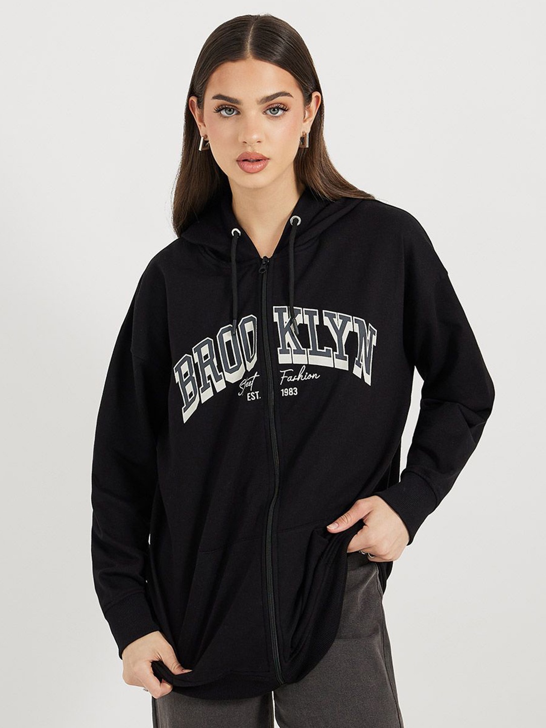 

Styli Women Oversized Fit Longline Zip Through Slogan Hoodie, Black