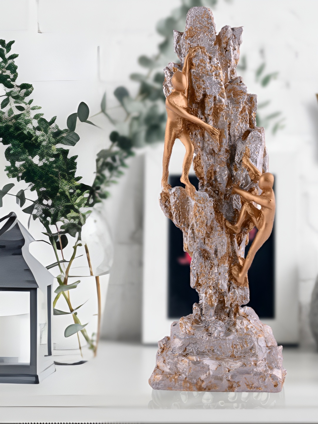 

Zart Silver-Toned Idol Showpiece