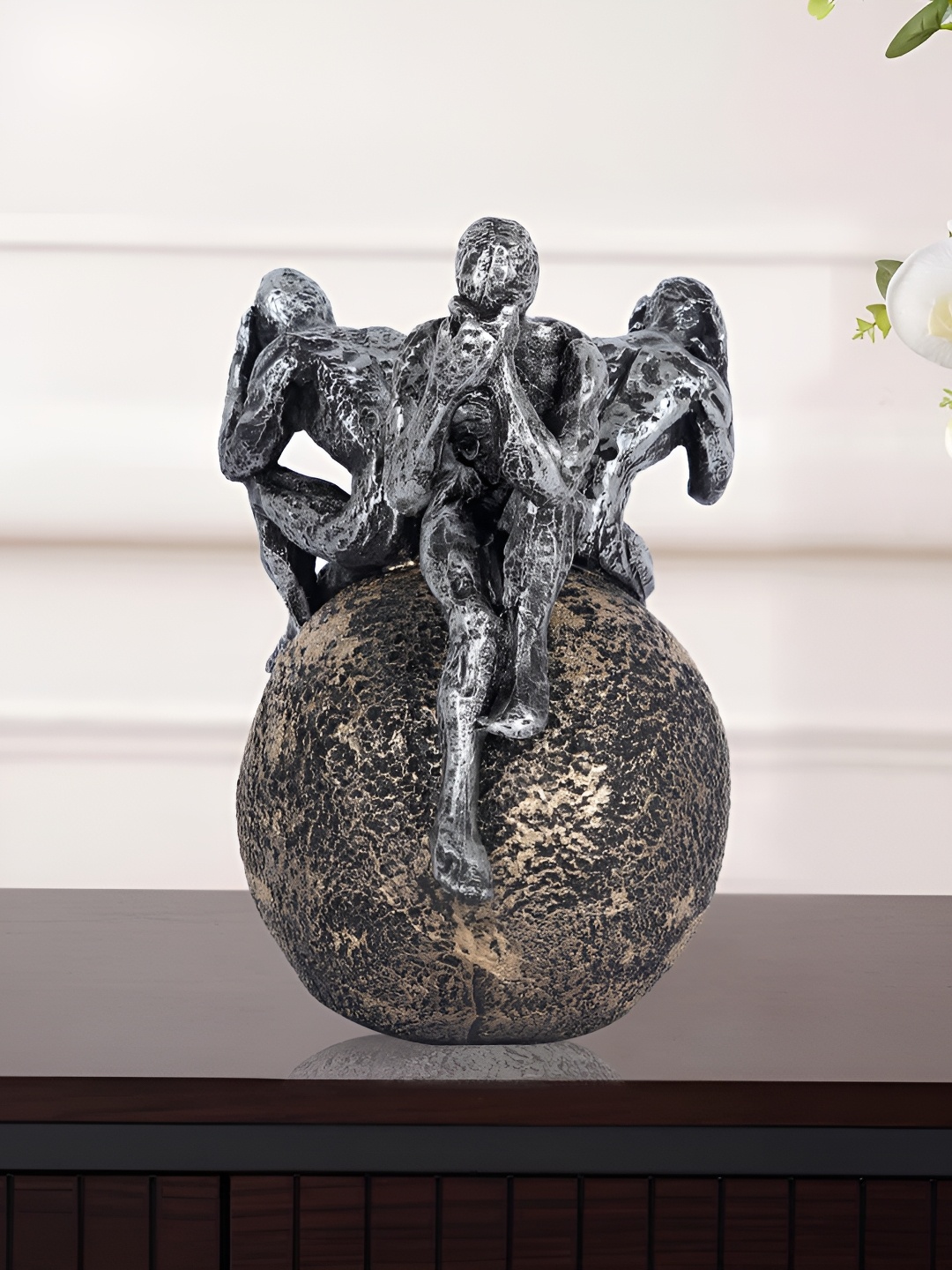 

Zart Silver-Toned Abstract Shaped Decorative Idol Showpiece
