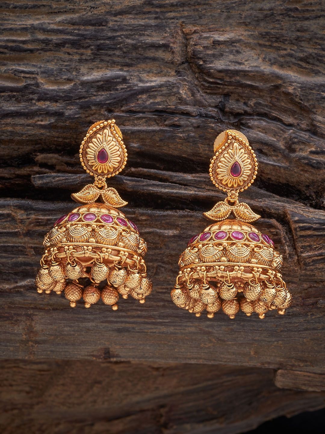 

Kushal's Fashion Jewellery Gold-Plated Ruby Stone Studded Antique Dome Shaped Jhumkas