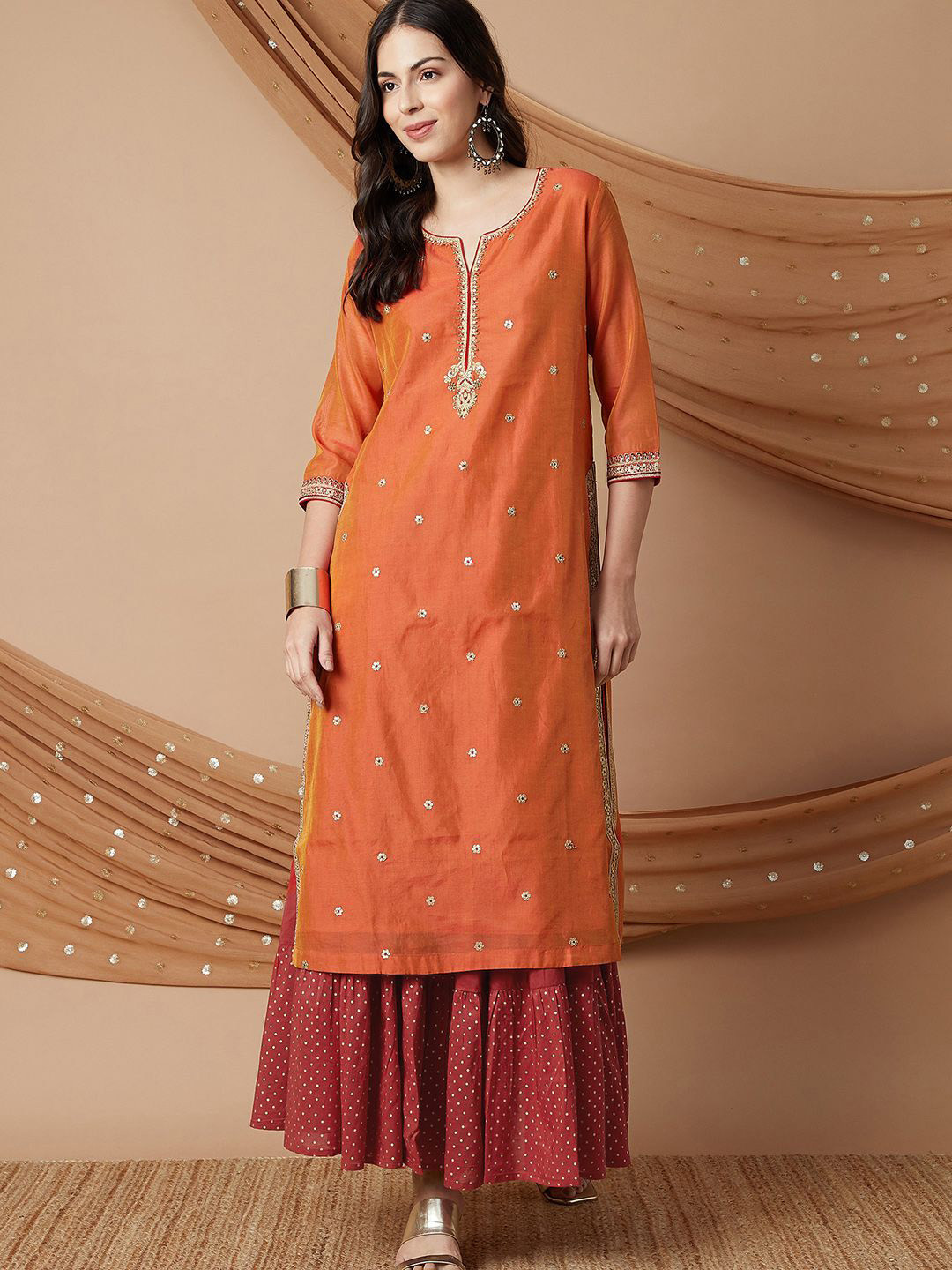 

Melange by Lifestyle Floral Embroidered Round Neck Sequinned Pure Cotton Kurta With Skirt, Rust