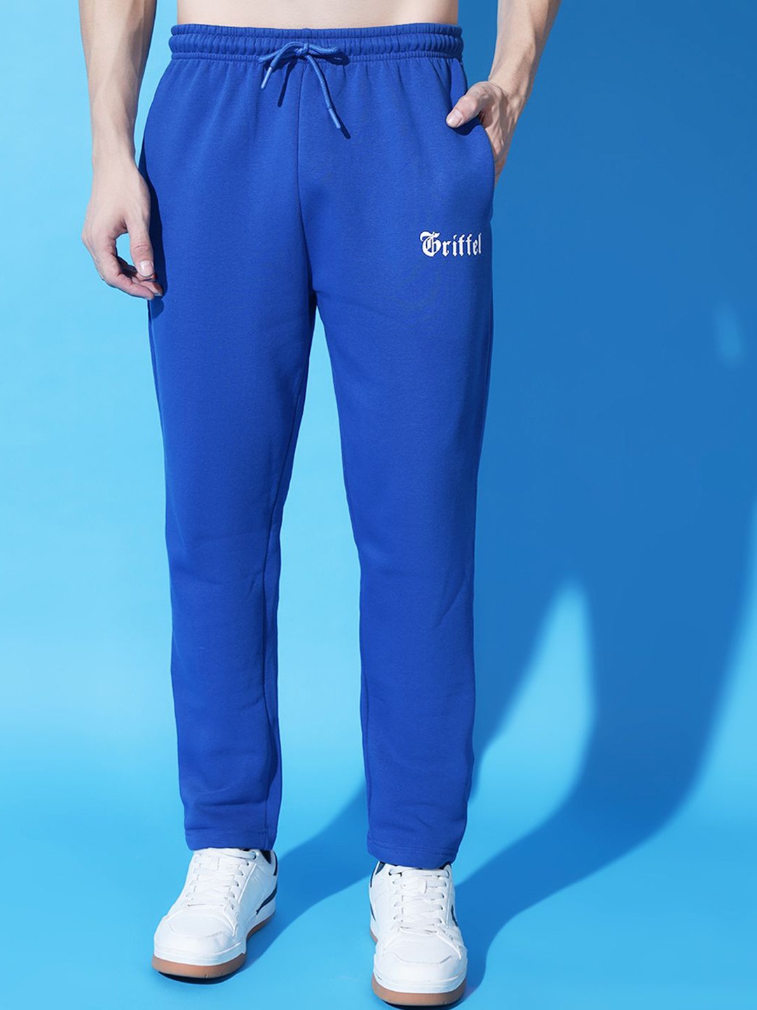 

GRIFFEL Men Brand Logo Printed Fleece Mid Rise Track Pants, Blue