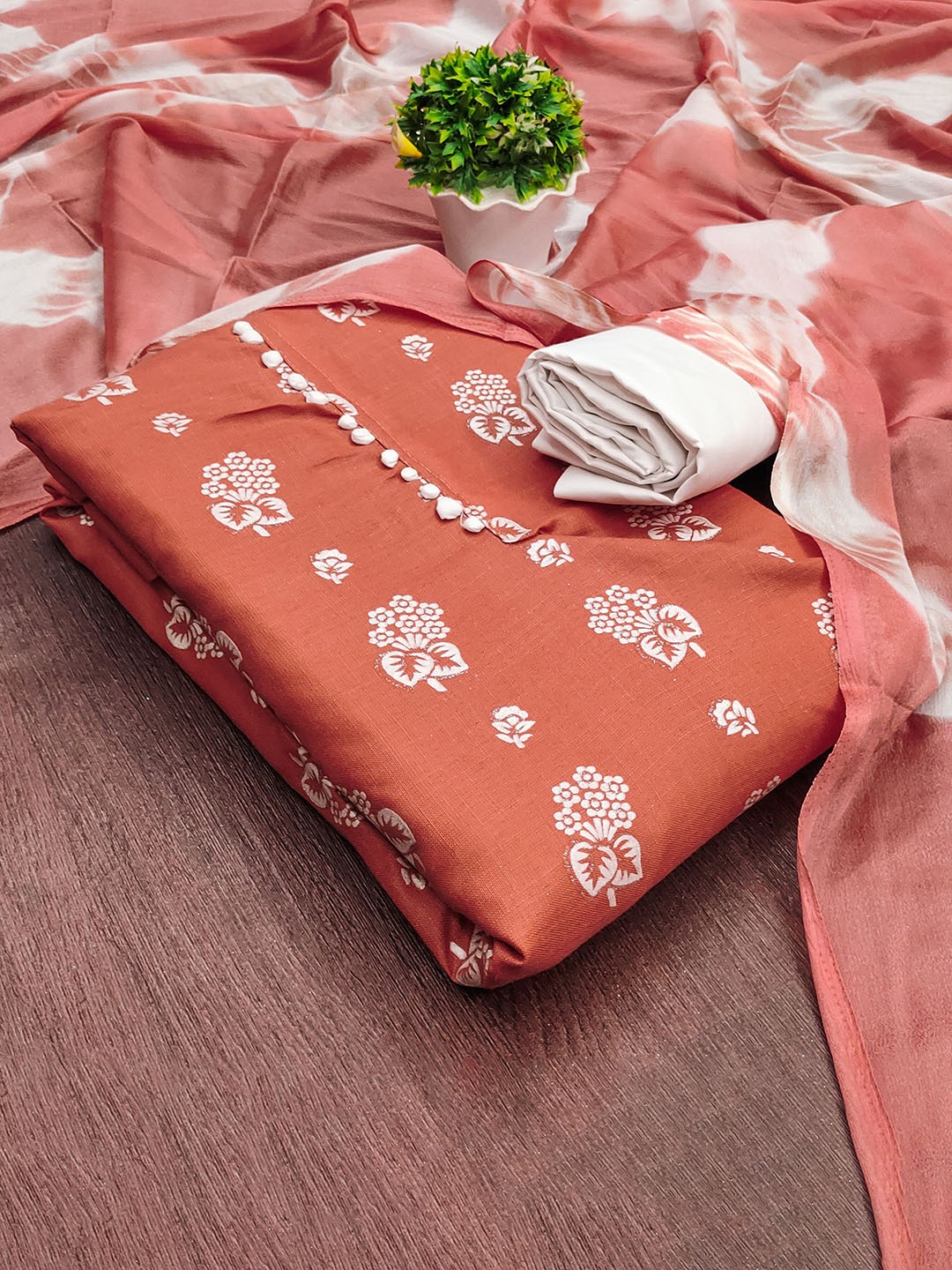

Maroosh Printed Unstitched Dress Material, Rust