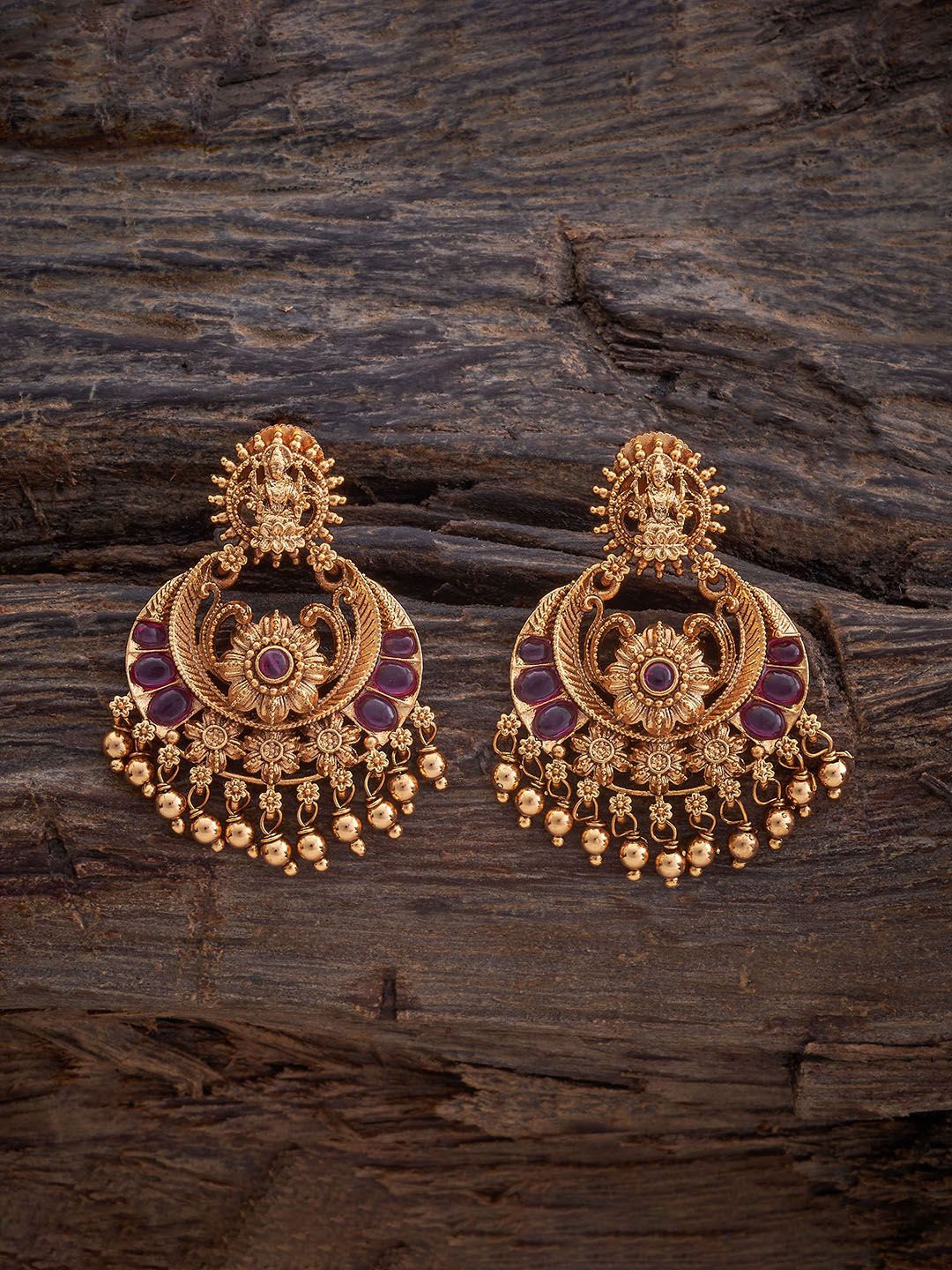 

Kushal's Fashion Jewellery Gold-Plated Stone Studded Crescent Shaped Chandbalis