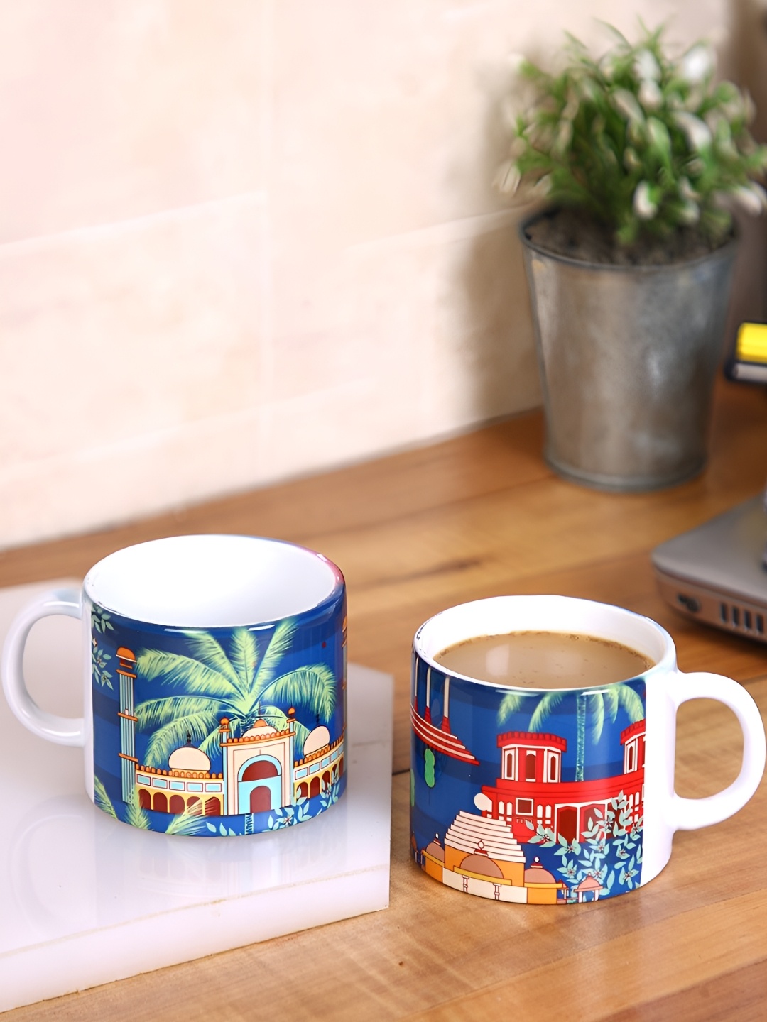 

PENTADECO White & Blue 2 Pieces Floral Printed Ceramic Glossy Mugs 160 ml