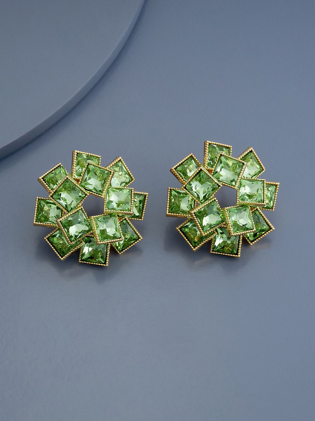 

Kushal's Fashion Jewellery Gold Plated Cubic Zirconia Studded Floral Studs Earrings