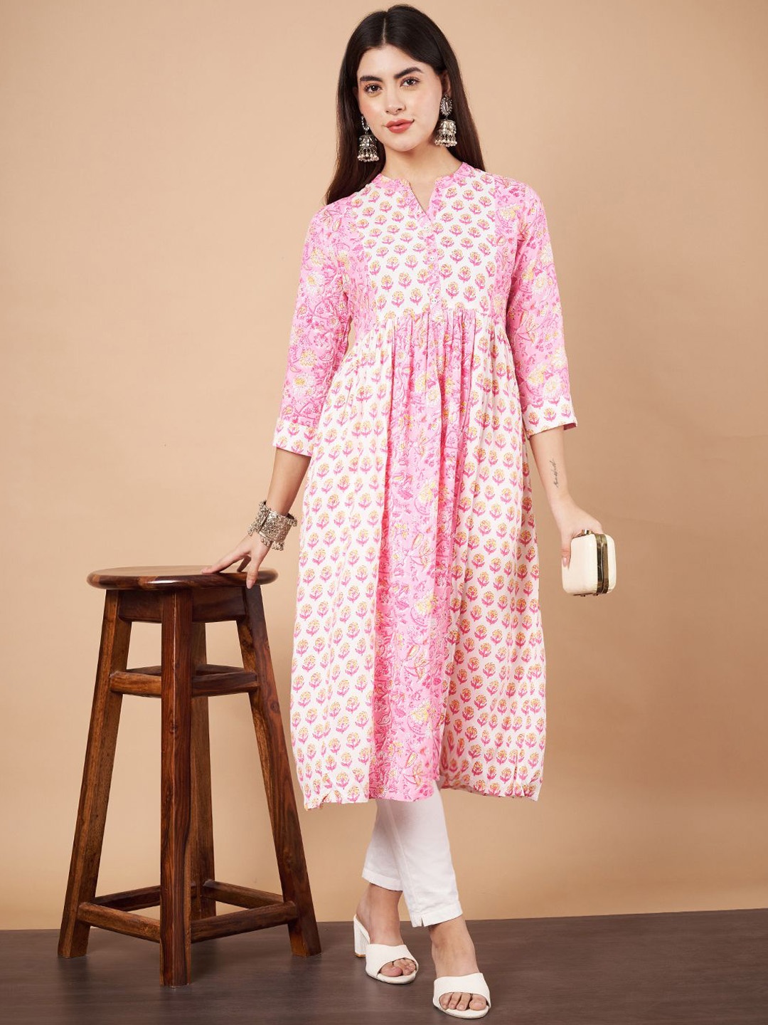 

Anouk Pink Floral Printed Mandarin Collar Three-Quarter Sleeves Pleated A-Line Kurta