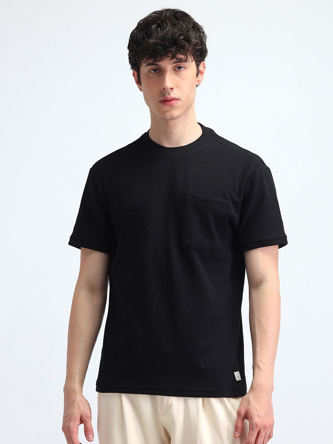

Flying Machine Men Solid Round Neck Cotton Relaxed Fit T-shirt, Black