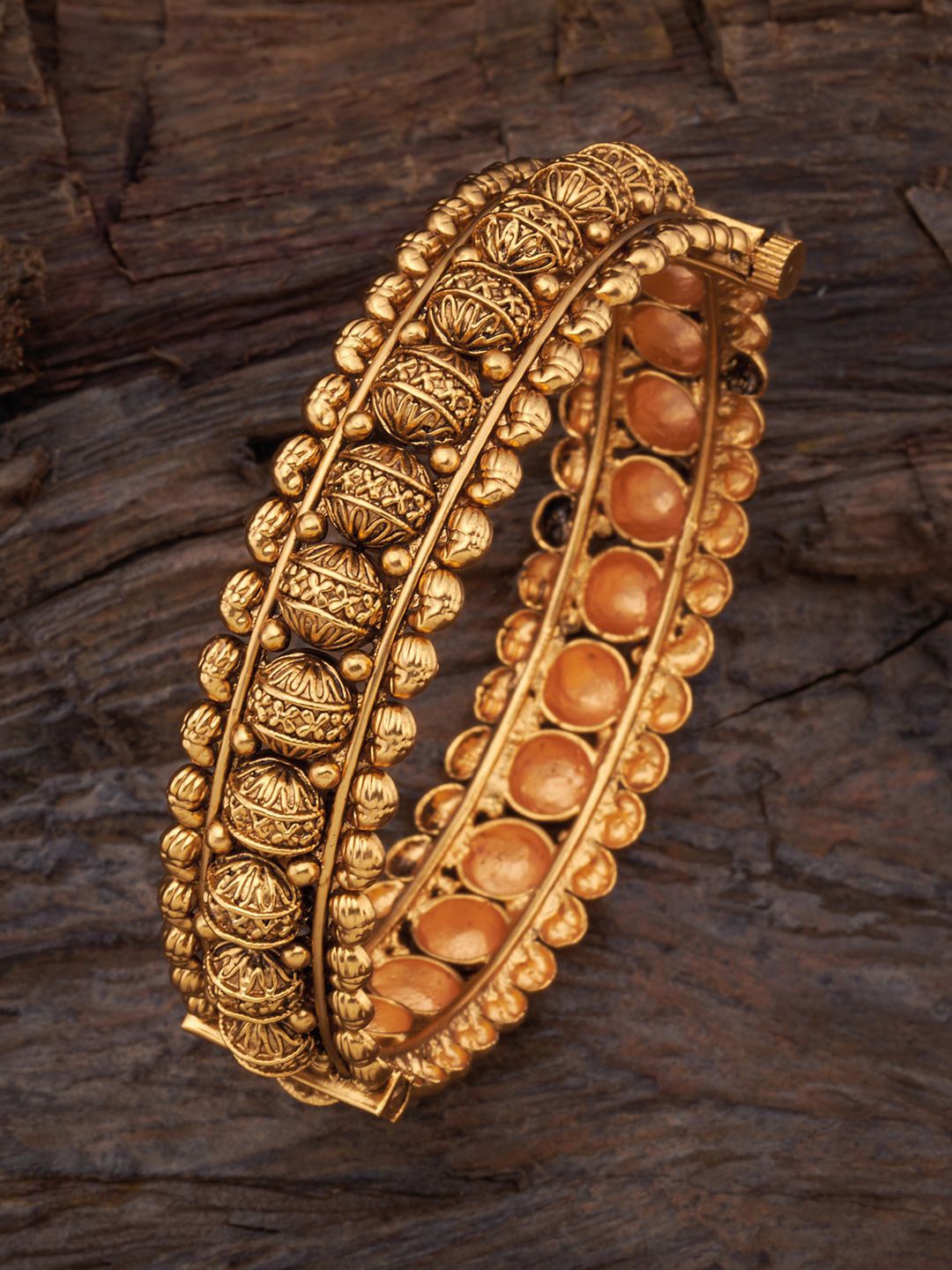

Kushal's Fashion Jewellery Gold Plated Textured Antique Bangle