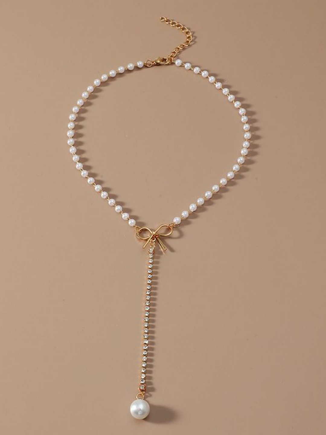 

YU FASHIONS Gold-Plated Rhinestone Studded & Pearls Beaded Bow Drop Pendant Necklace