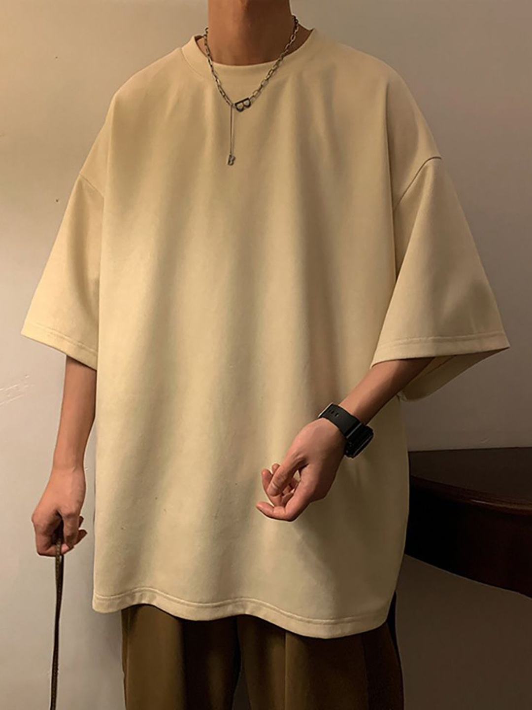 

StyleCast x Revolte Men Solid Round Neck T-shirt, Beige