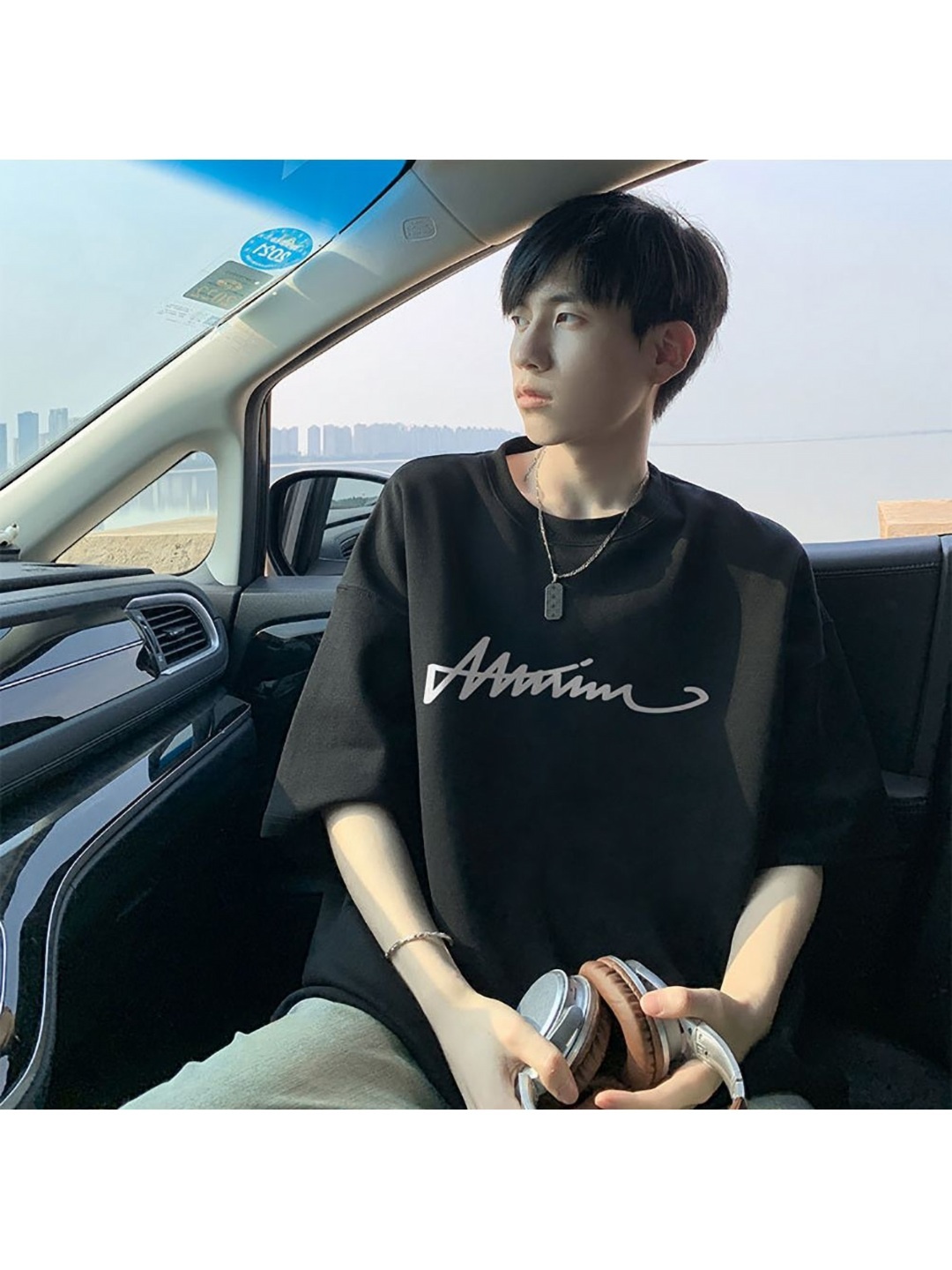 

StyleCast x Revolte Men Typography Printed Round Neck Oversized T-shirt, Black