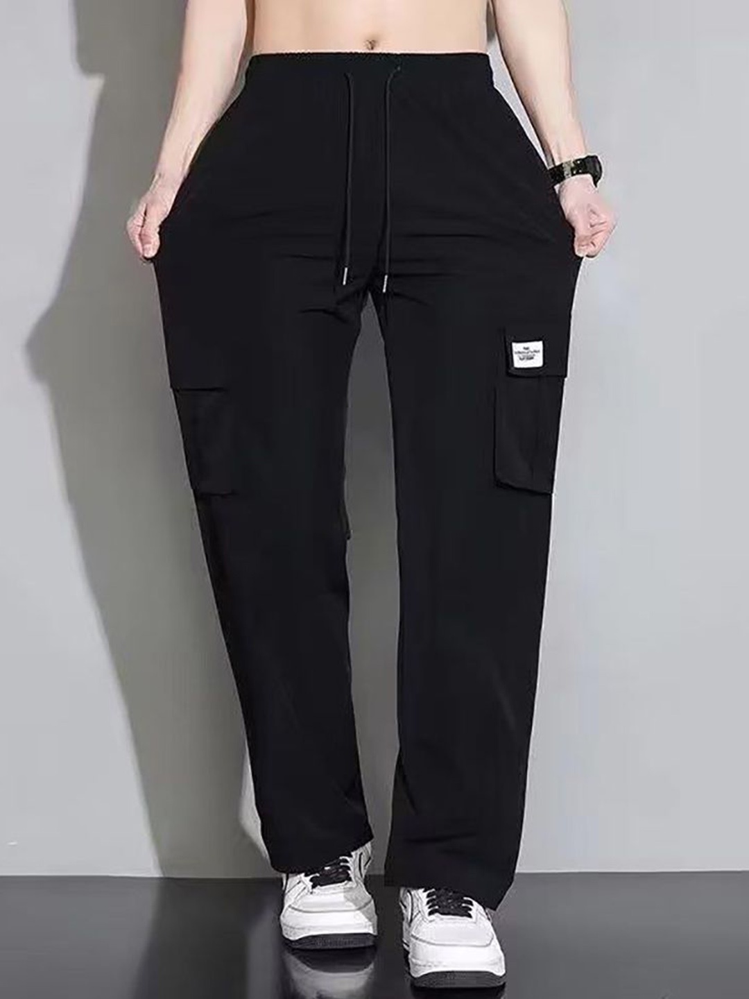

StyleCast x Revolte Men Solid Straight Fit Mid-Rise Chinos Trousers, Black