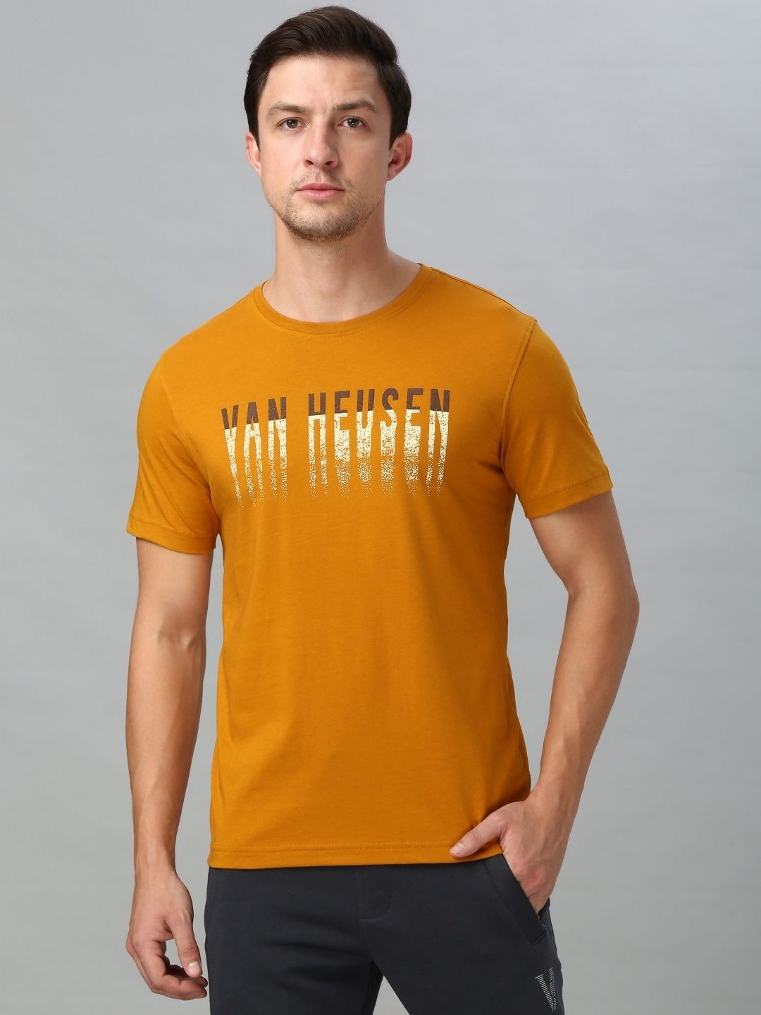 

Van Heusen Men Graphic Printed Round Neck Cotton T-shirt, Mustard