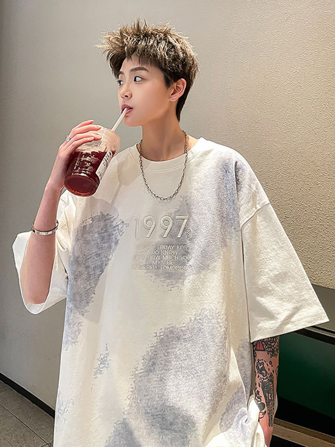

StyleCast x Revolte Men Abstract Printed Round Neck Cotton Oversized T-shirt, White