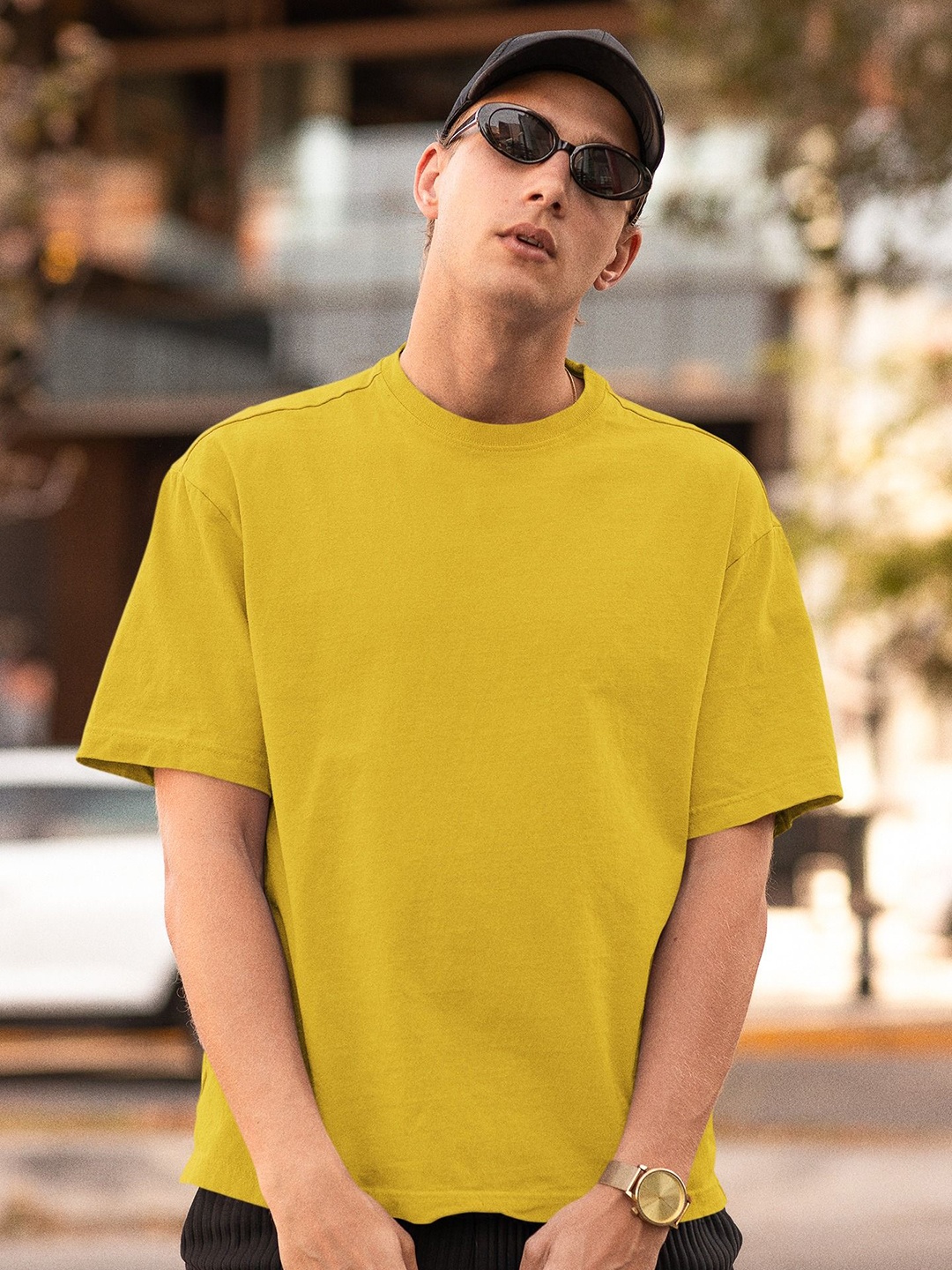 

Elibolz Men Oversized Solid Bio Finish T-shirt, Yellow