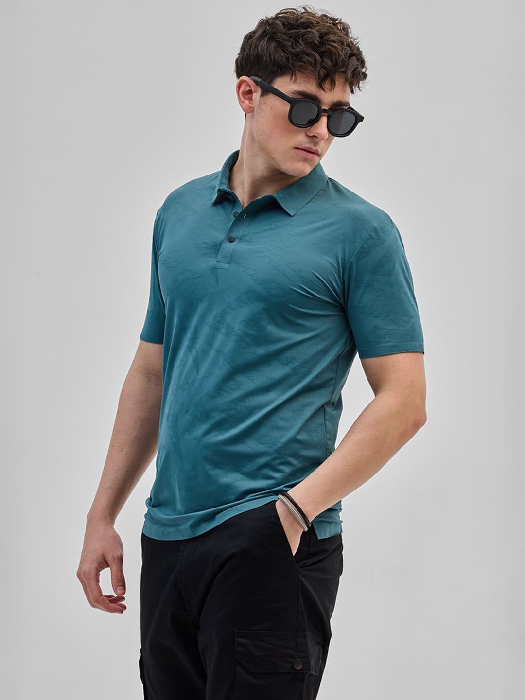 

Snitch Men Self Design Polo Collar Slim Fit T-shirt, Teal