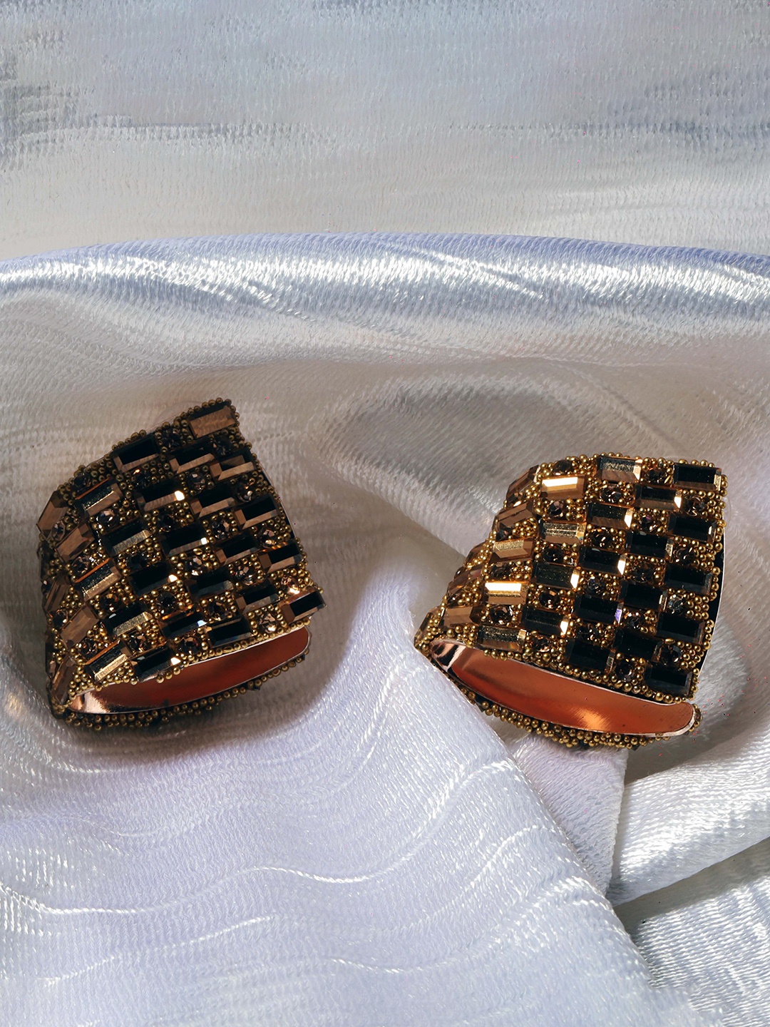 

Maansh Rose Gold Plated Cubic Zirconia Contemporary Studs