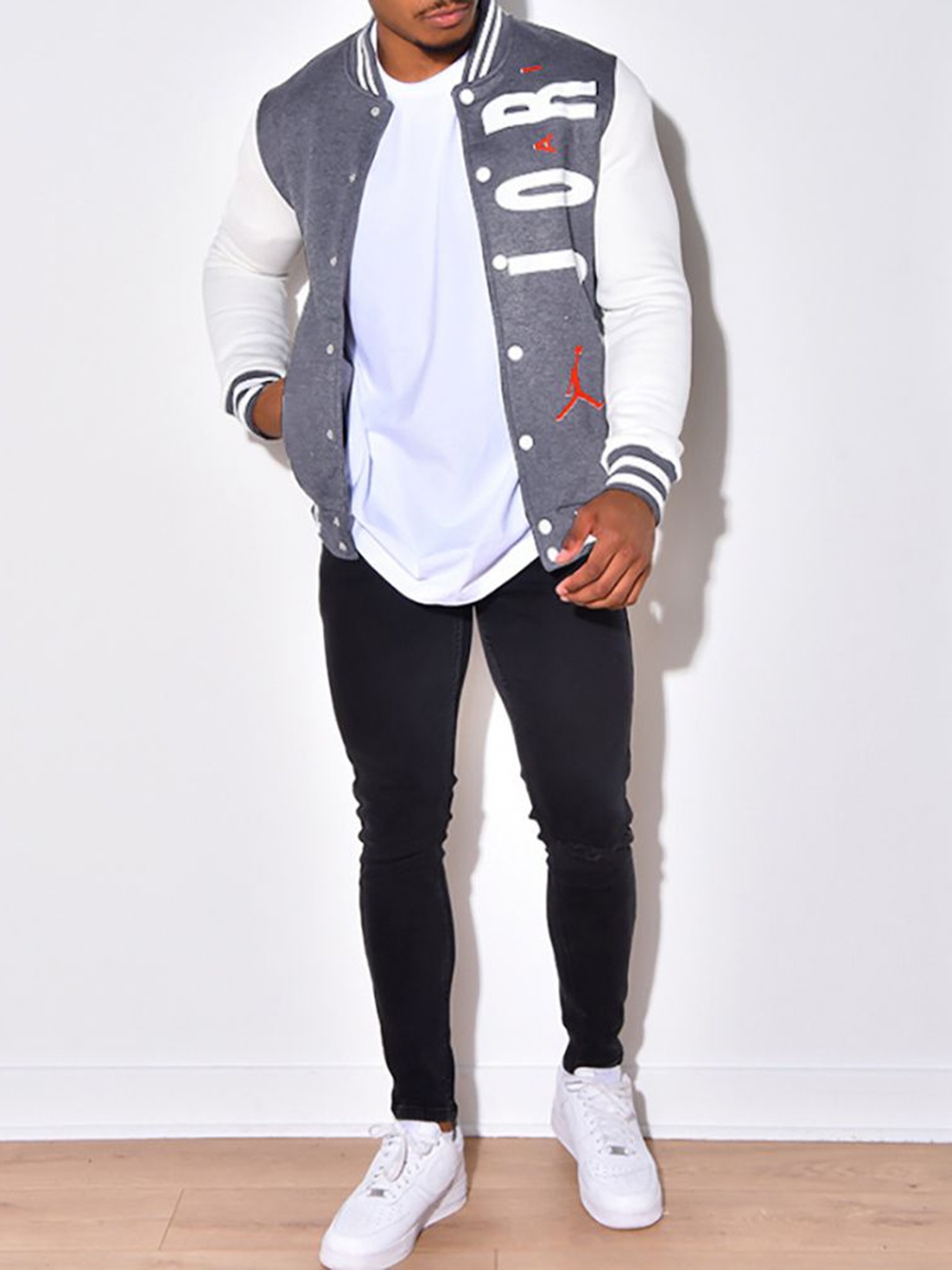 

StyleCast x Revolte Men Stand Collar Typography Printed Casual Varsity Jacket, Grey