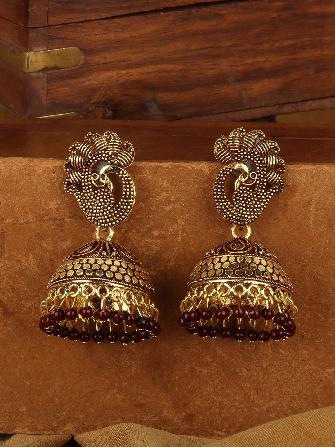 

Anouk Gold-Plated Dome & Peacock Shaped Enamelled Beaded Jhumkas