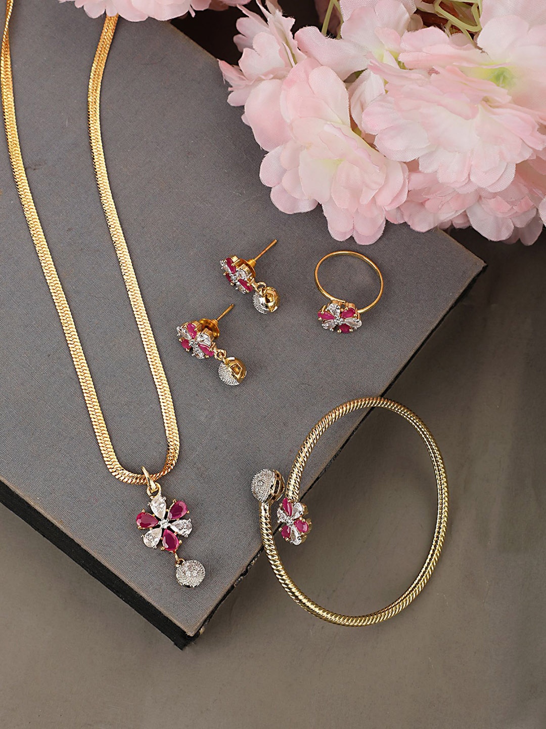 

Anouk Gold-Plated AD Stone Studded Pendant Earrings With Bracelet & Ring