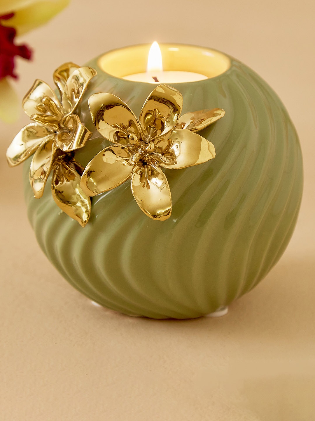 

Home Centre Green & Gold-Toned Ceramic Candle Holder
