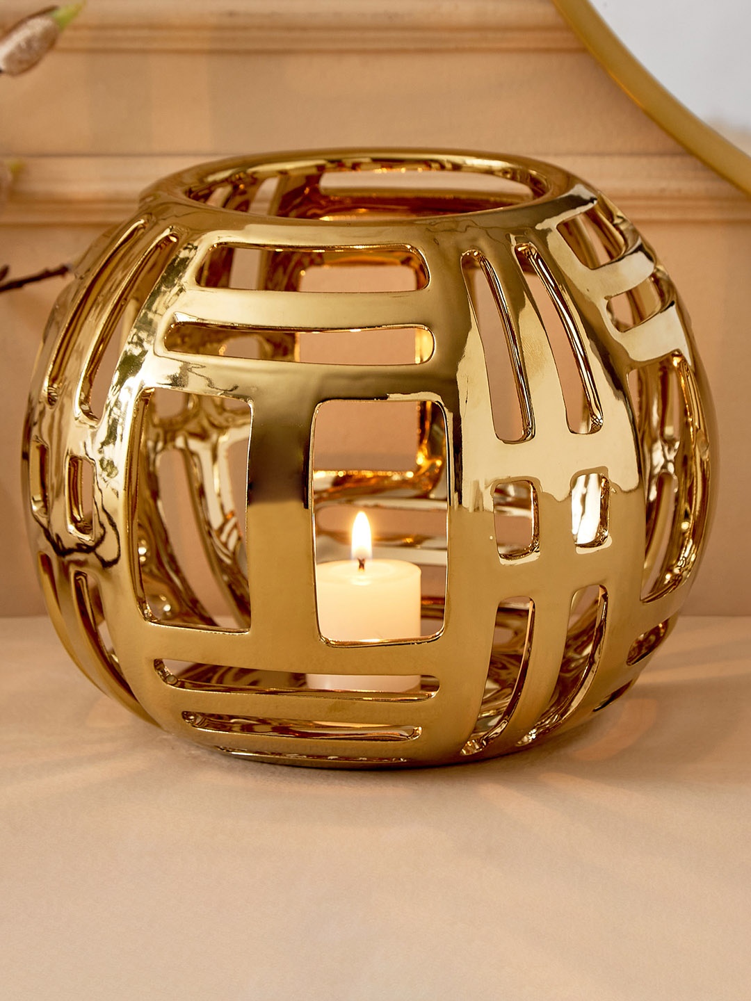 

Home Centre Gold-Toned Textured Ceramic Candle Holder