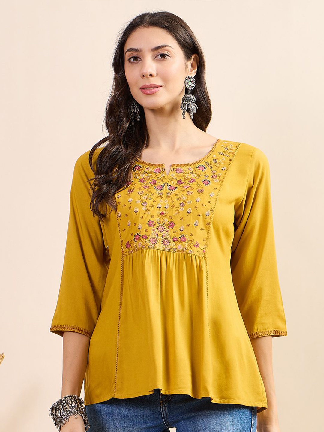 

Anouk Women Floral Embroidered Round Neck Top, Mustard