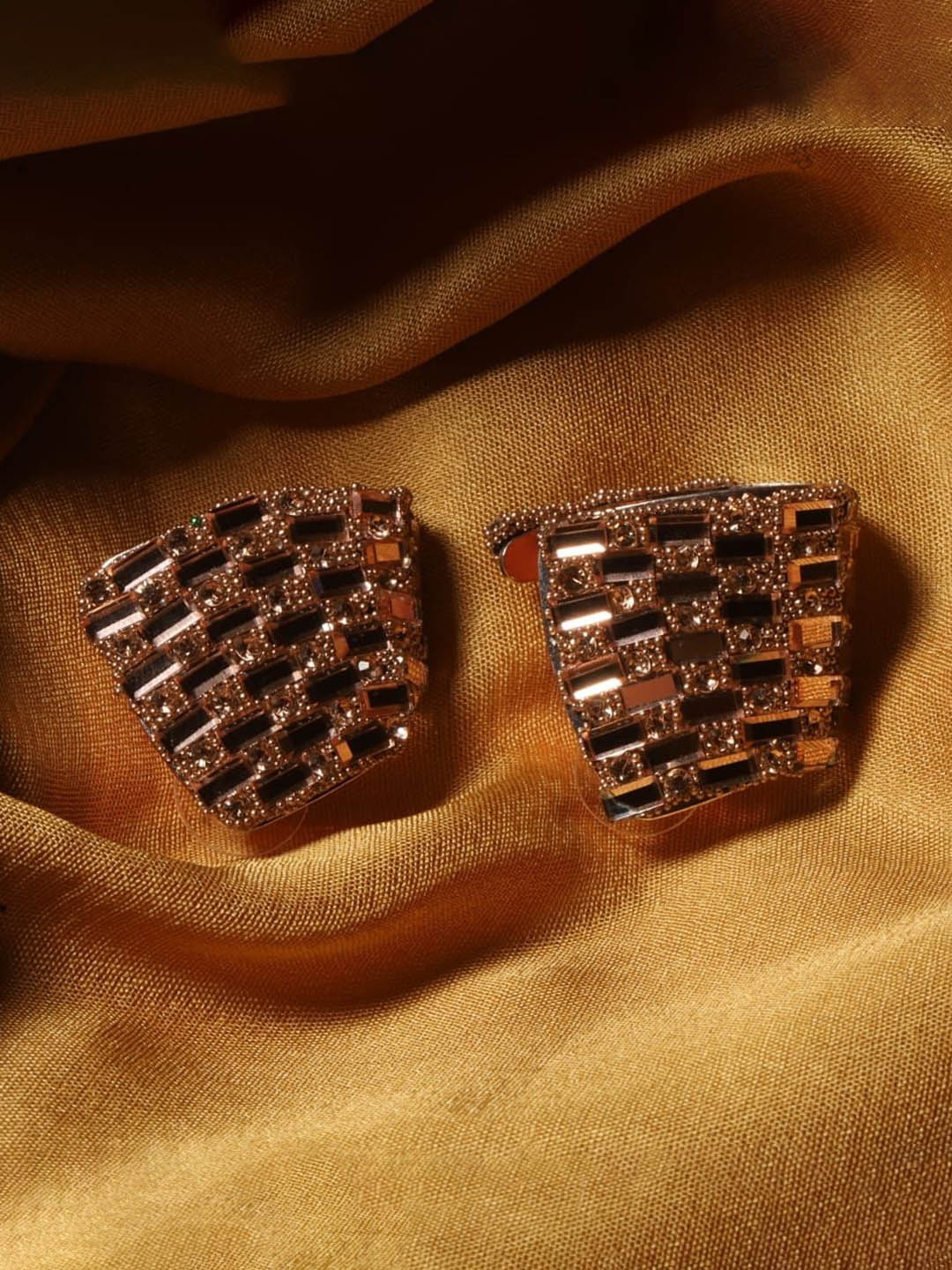 

Maansh Rose Gold Plated Cubic Zirconia Contemporary Studs