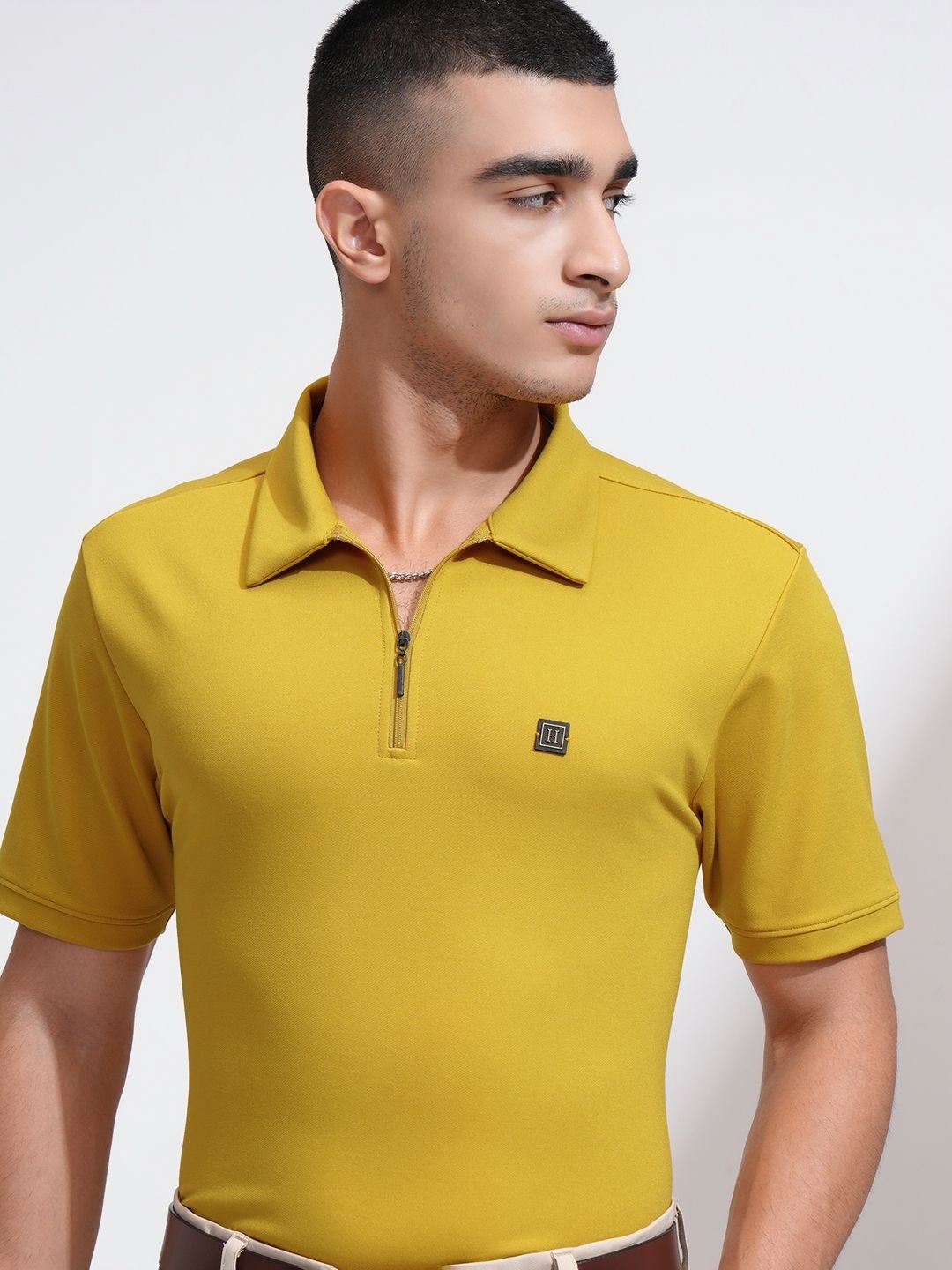 

HIGHLANDER Men Solid Polo Collar T-shirt, Mustard