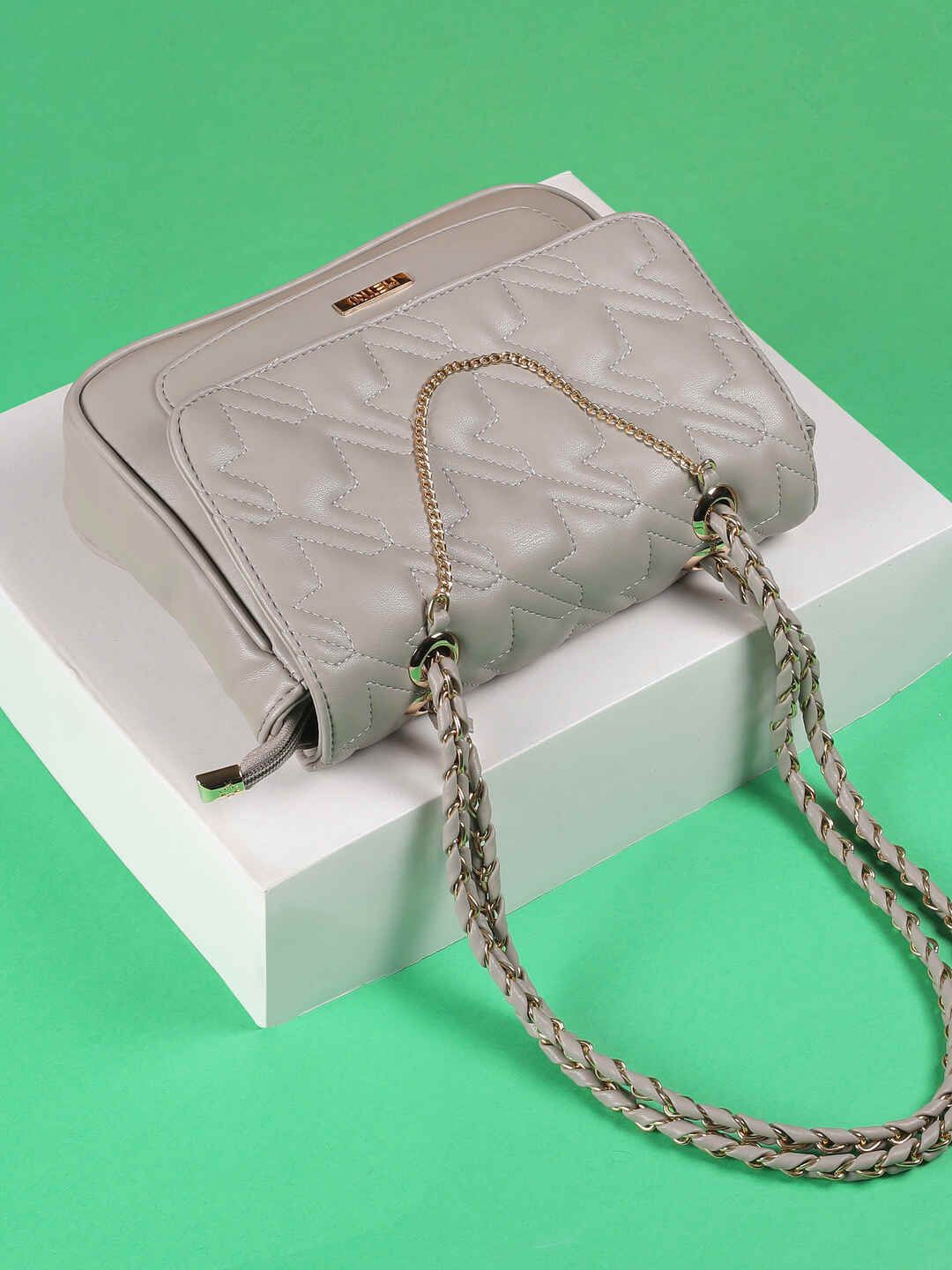 

Metro Women Textured Swagger Sling Bag, Grey