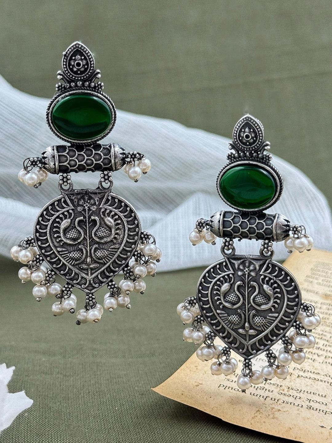 

NAMAN ARTS Silver-Plated Kundan Studded Contemporary Oxidised Drop Earrings