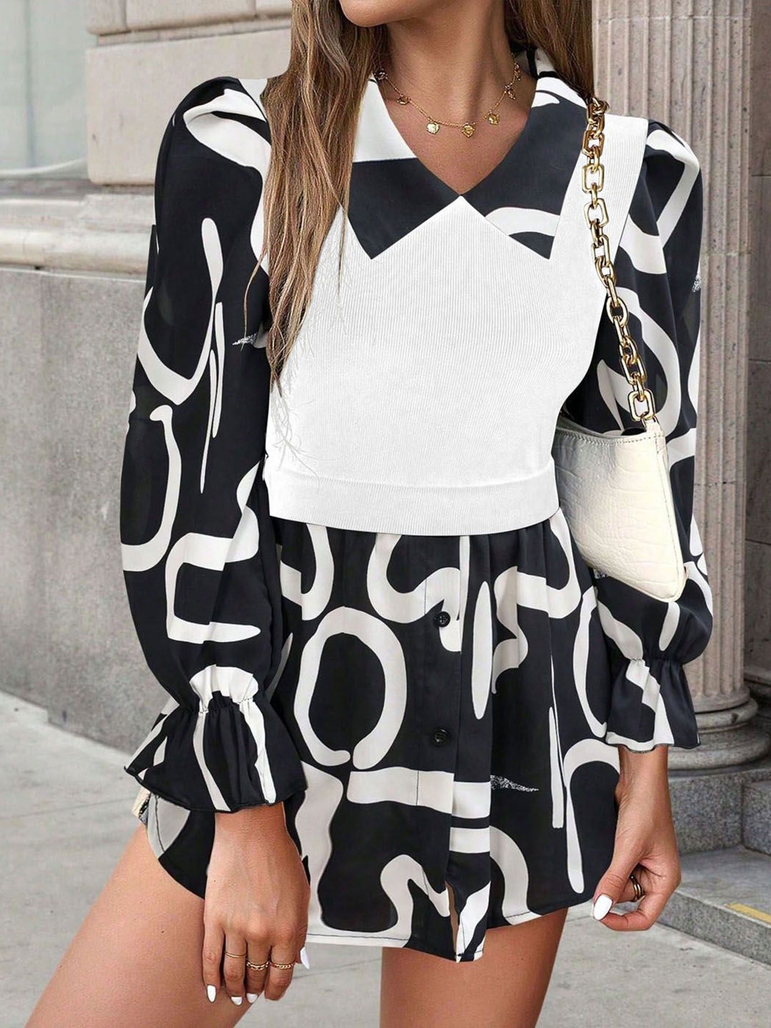 

StyleCast Women Abstract Printed Puff Sleeves Top, Black