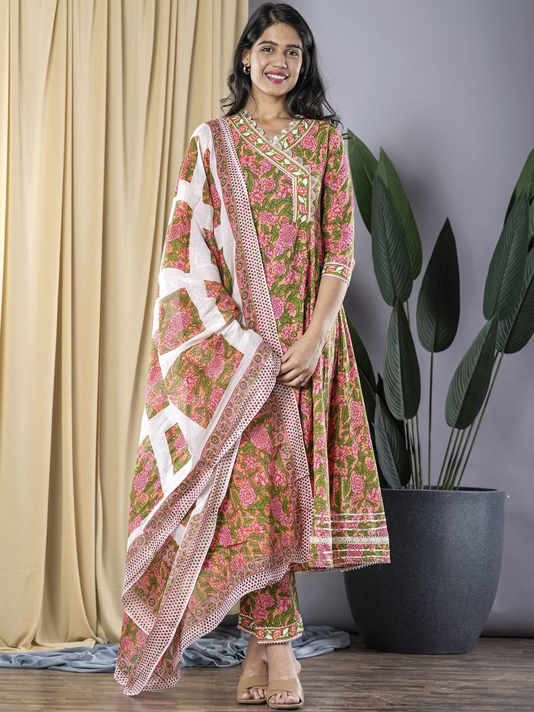 

KALINI Floral Printed V-Neck Gotta Patti Pure Cotton Anarkali Kurta With Trouser & Dupatta, Peach