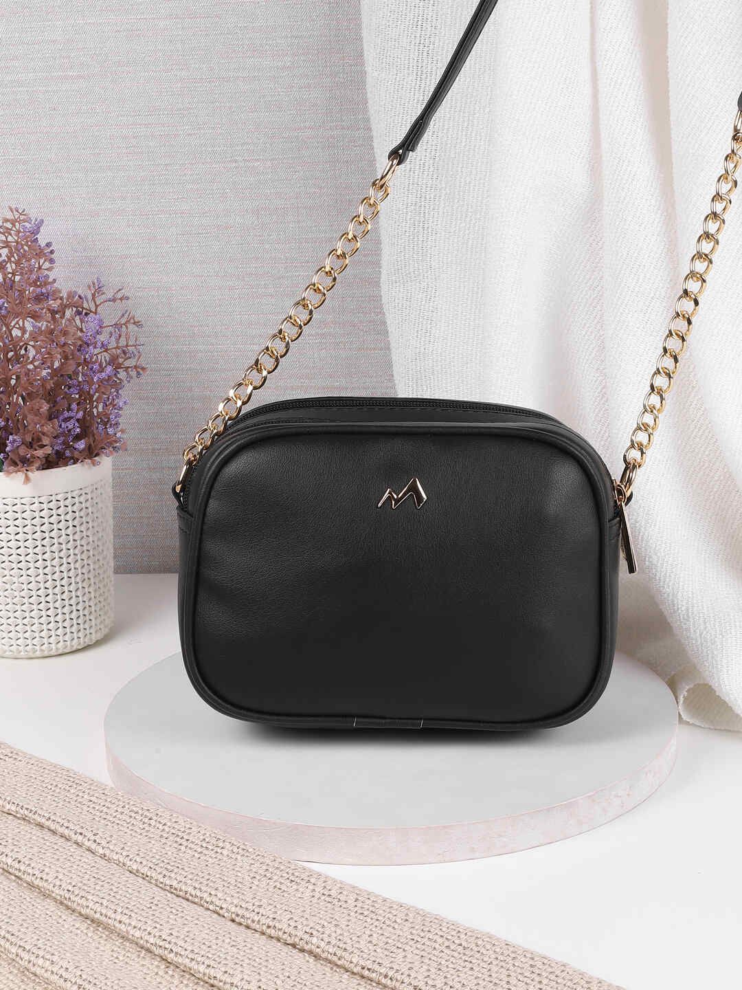 

Metro Women Textured Swagger Sling Bag, Black