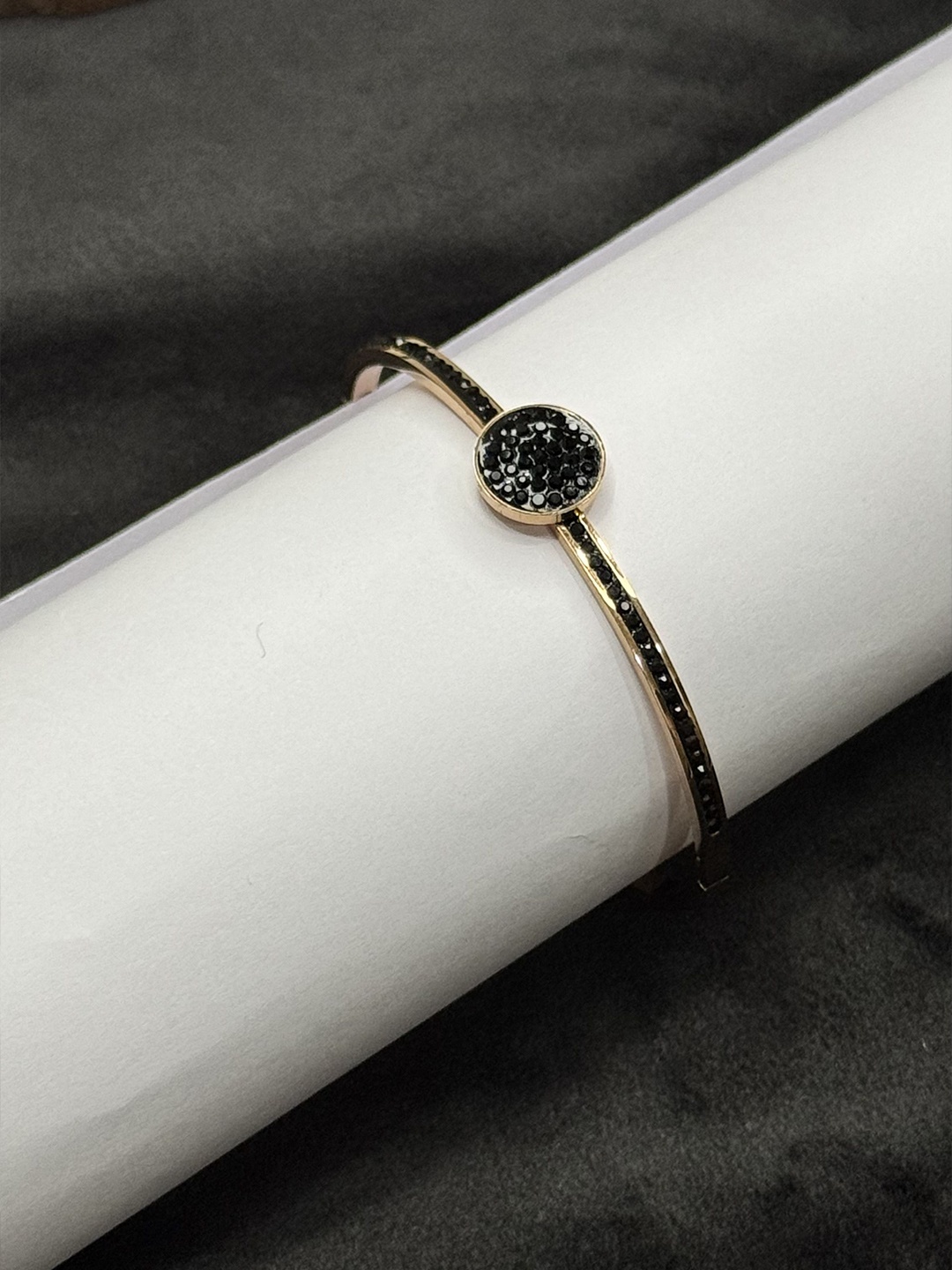 

The Jewellery Tale Rose Gold-Plated Stone Studded Bangle-Style Bracelet