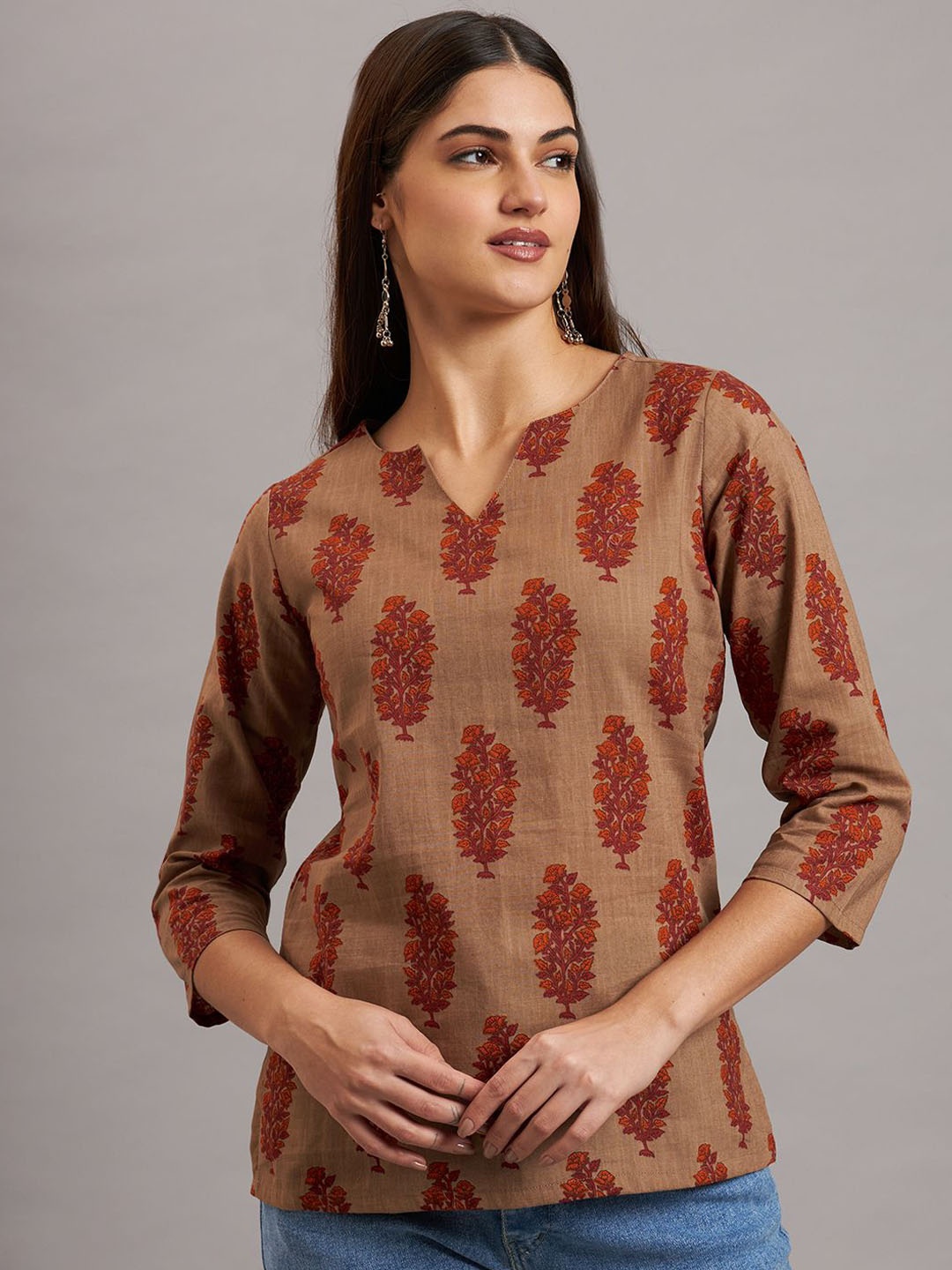 

Ojjasvi Ethnic Motifs Printed Notch Neck Regular Straight Kurti, Tan