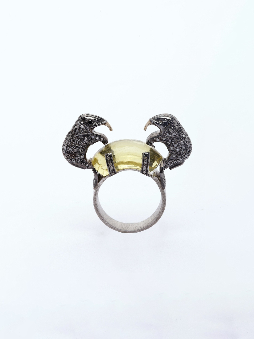 

Exotic India Sterling Silver Yellow Chalcedony Ring with Diamond Two Elephants